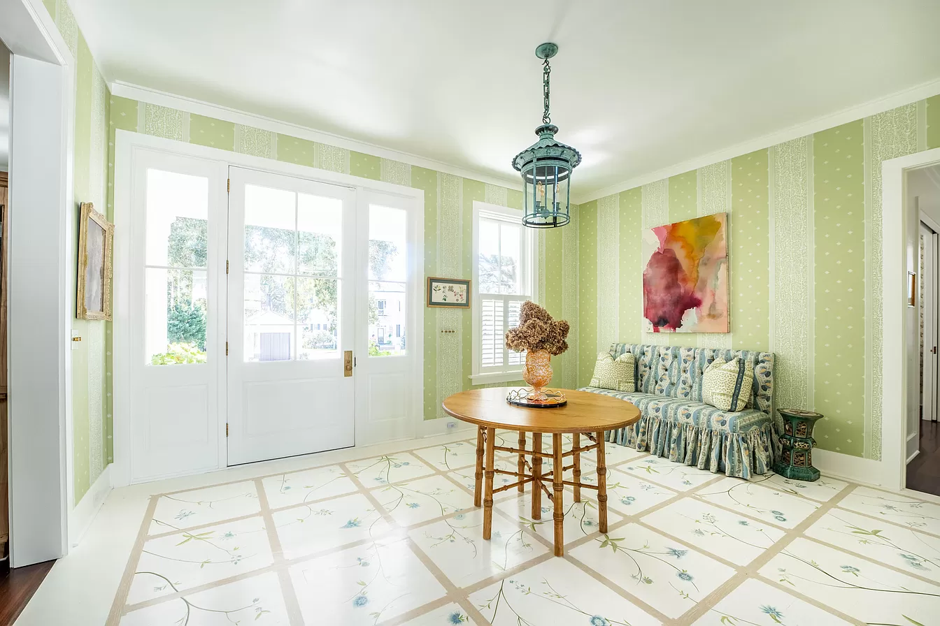 Foyered with traditional decor showcasing vibrant green featured in Julia Berolzheimer home tour