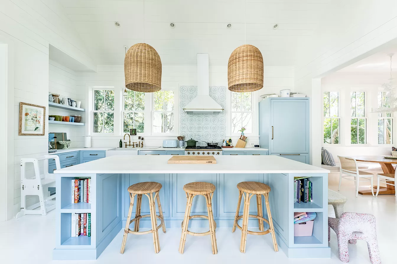 Kitchen showcasing light blue and white with traditional decor featured in Julia Berolzheimer home tour