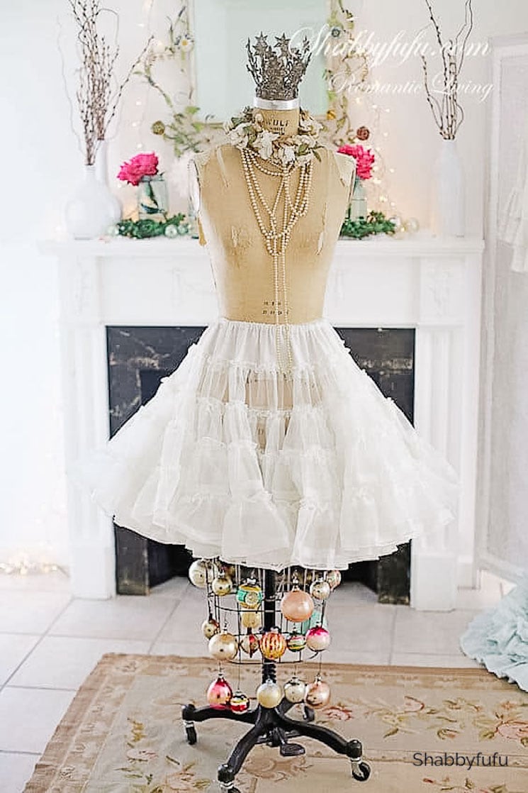 vintage dress form with shiney brite ornaments