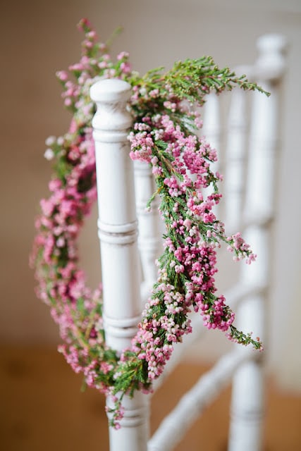 pink wreath idea placed on staircase