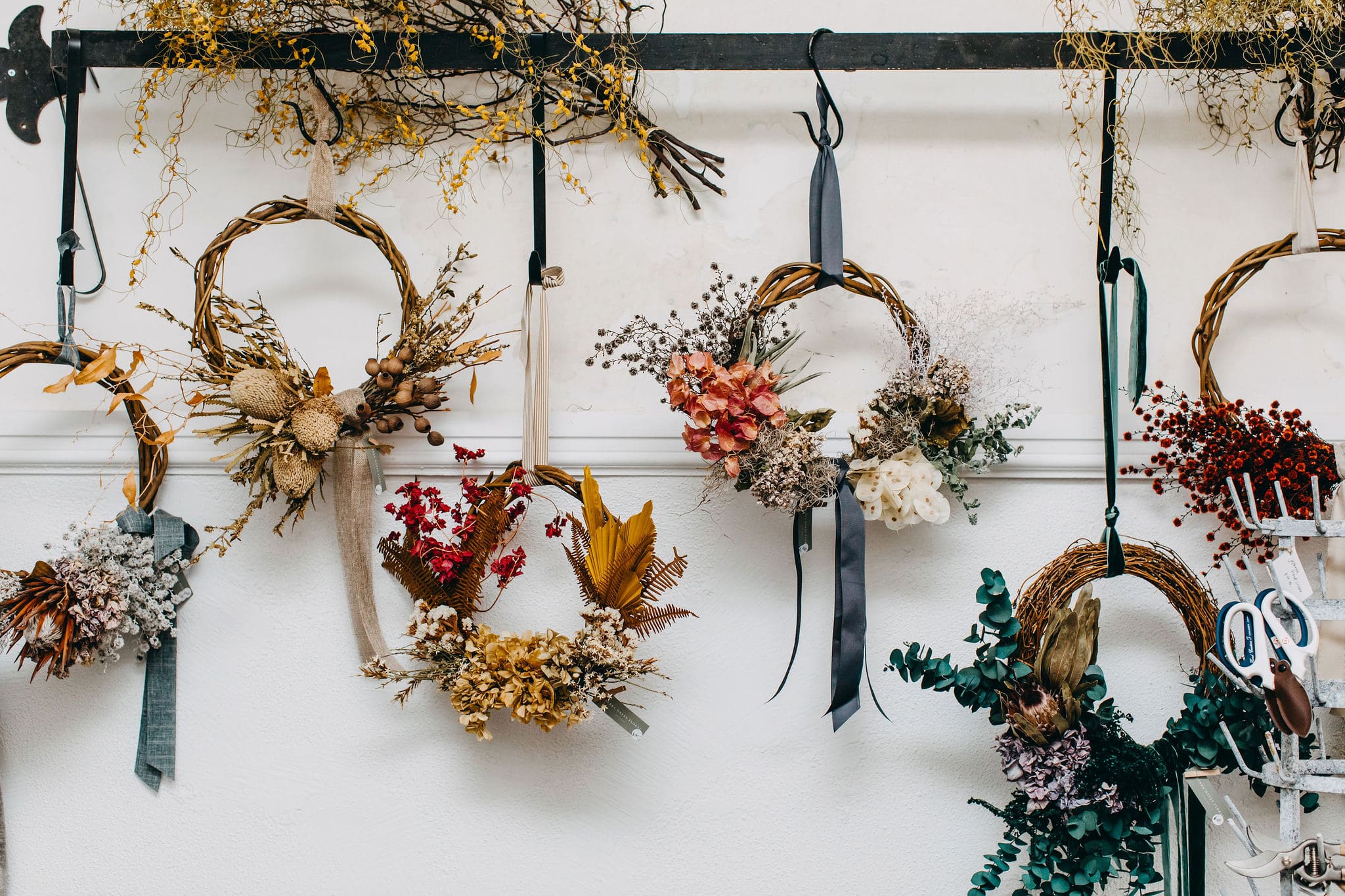 wreath idea featuring a gallery wall of wreaths