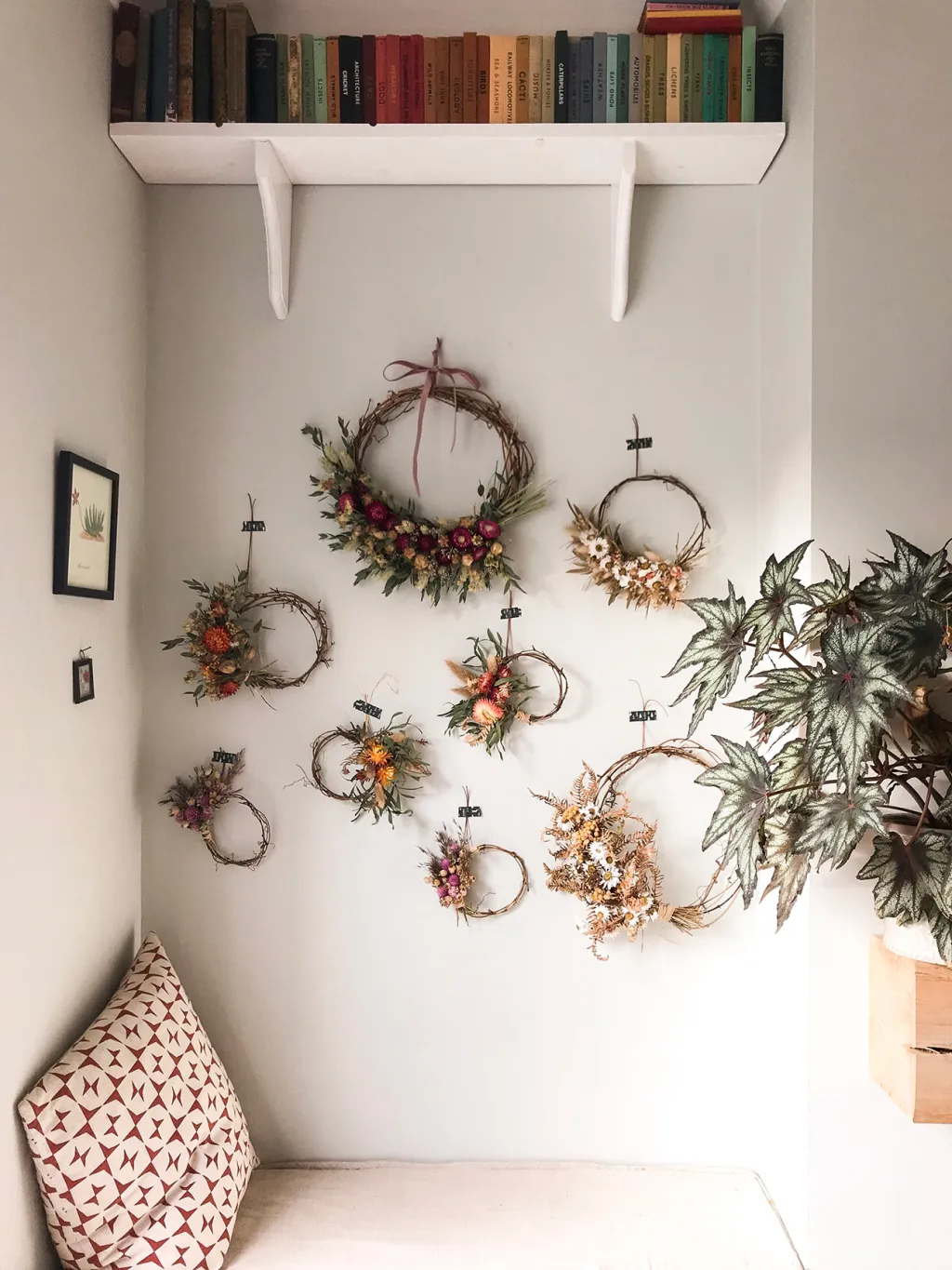 wreath idea featuring a gallery wall of wreaths