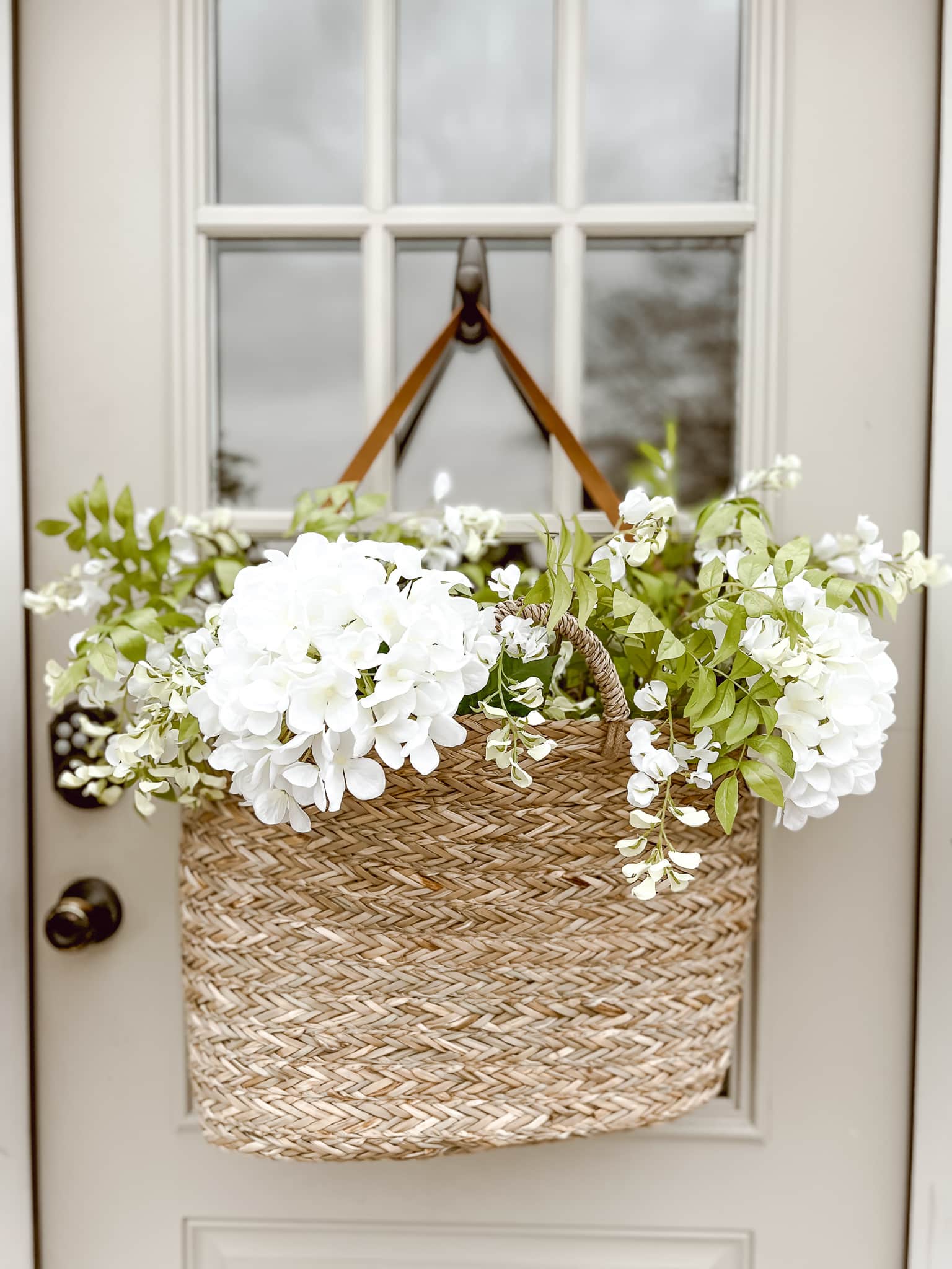 citrus themed basket as a wreath idea in front door