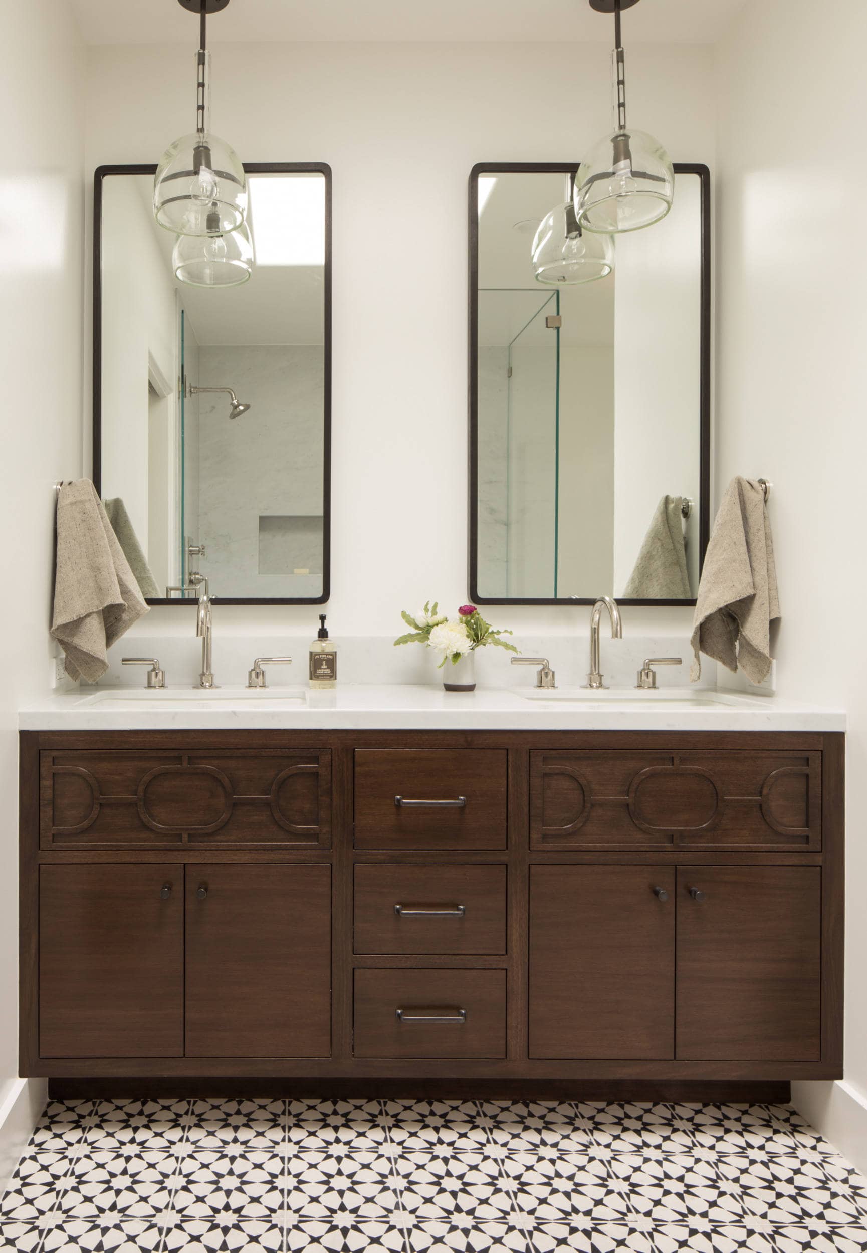 California Casual Design home tour in Hillsborough featuring modern bathroom with double wood vanity