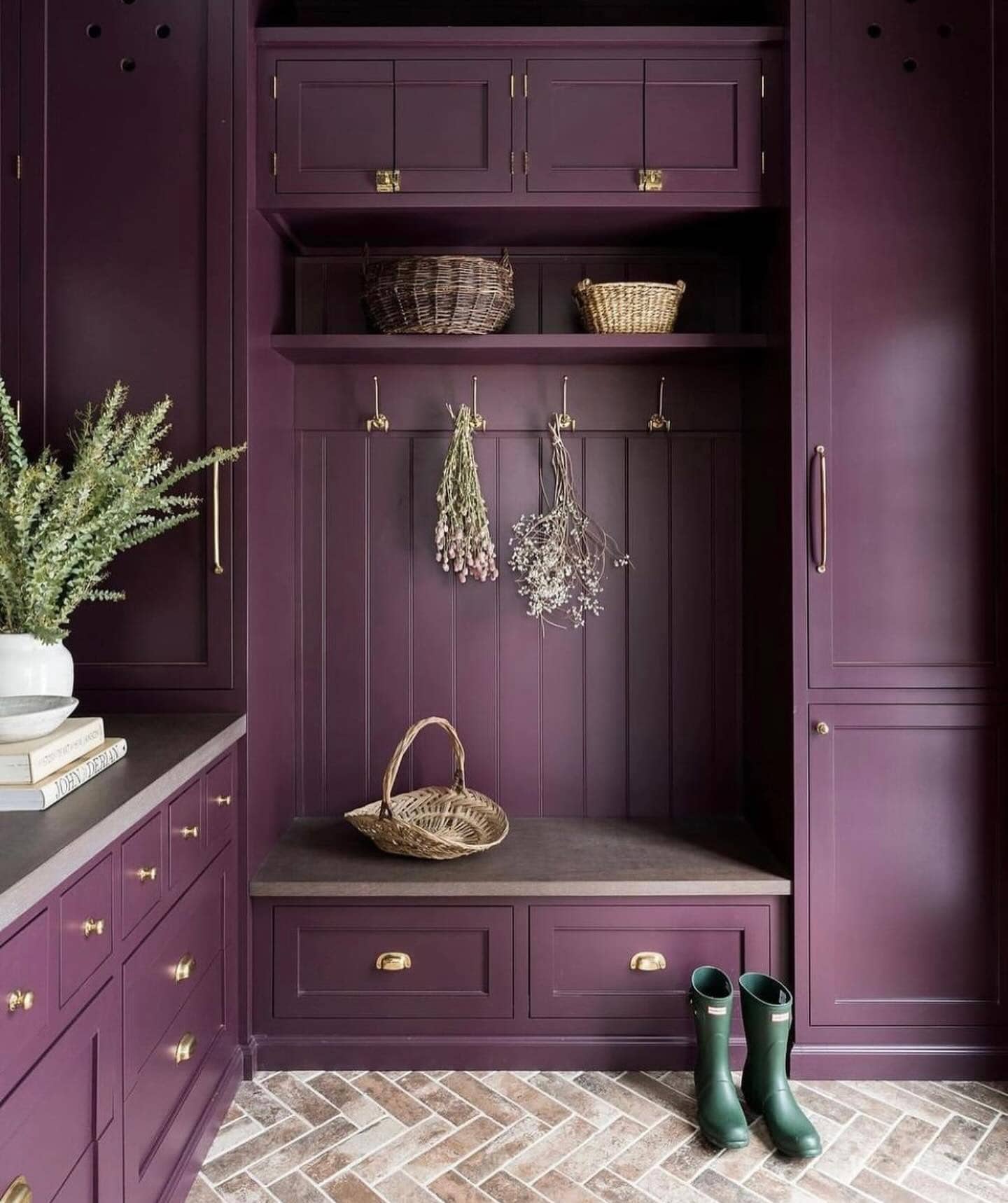 home decor design trends for 2024 featuring mudroom in deep purple color