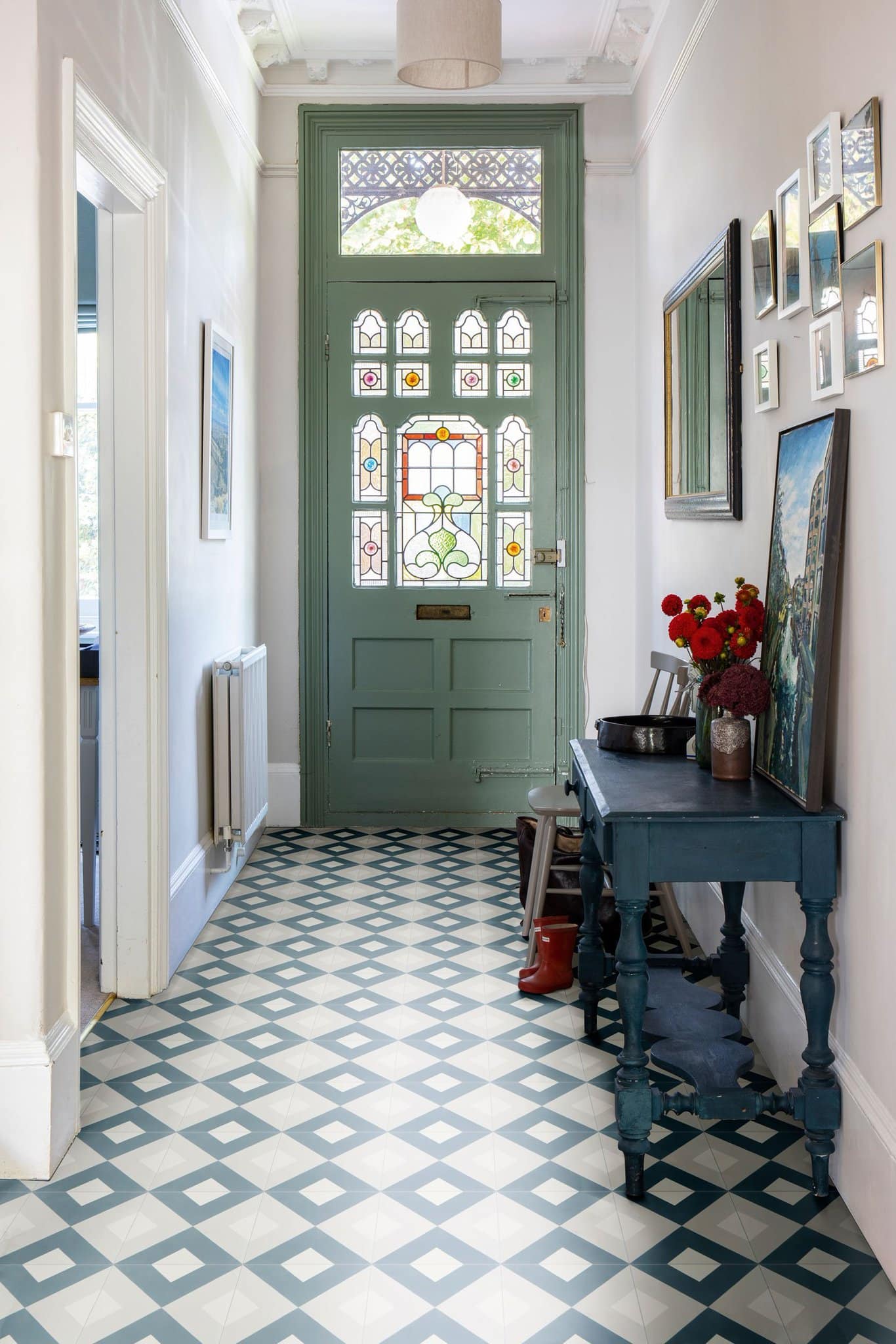 Timeless allure of old homes example showcasing a entryway with doow featuring stained glass