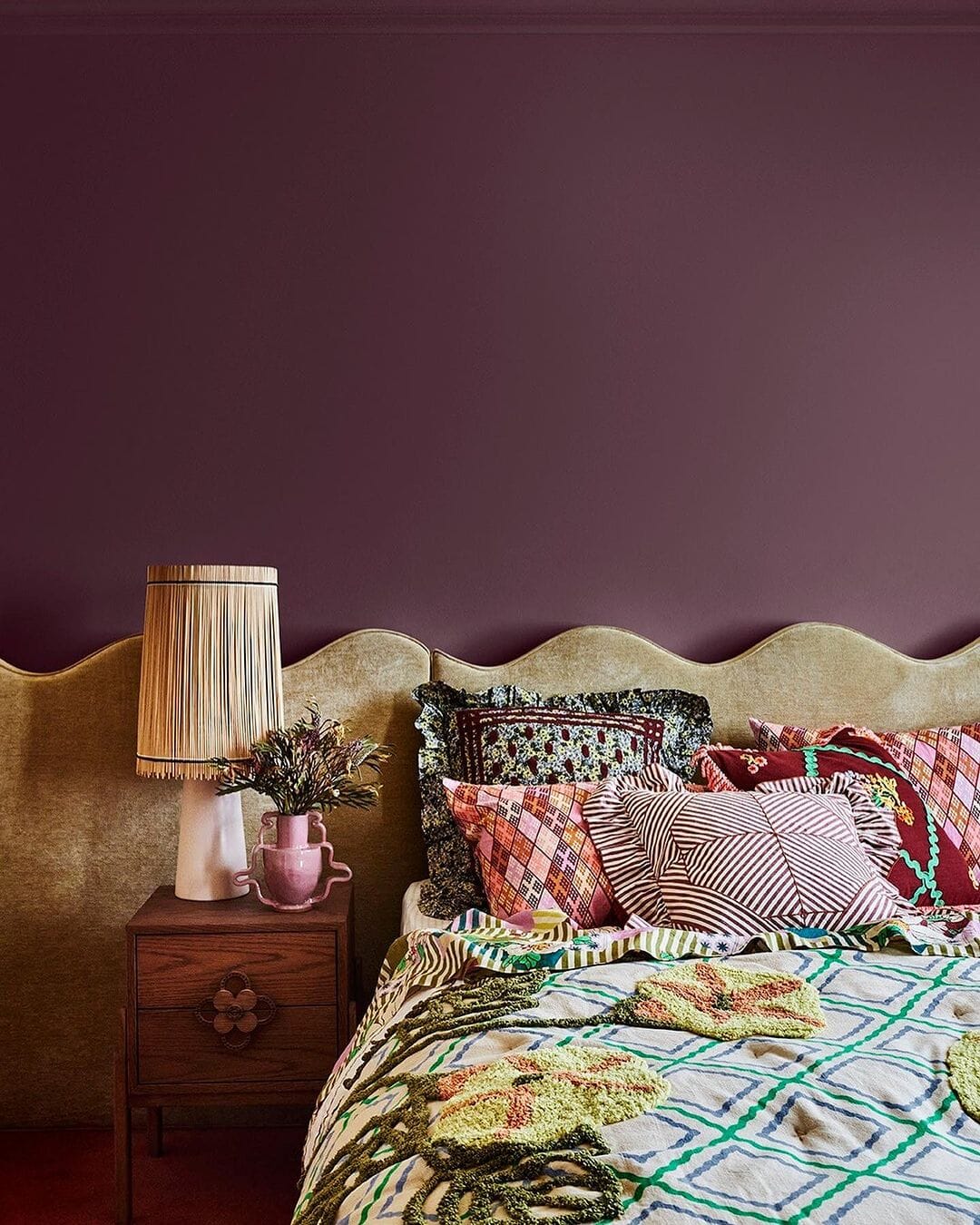 bedrooom featuring purple walls styled with trendy decor elements