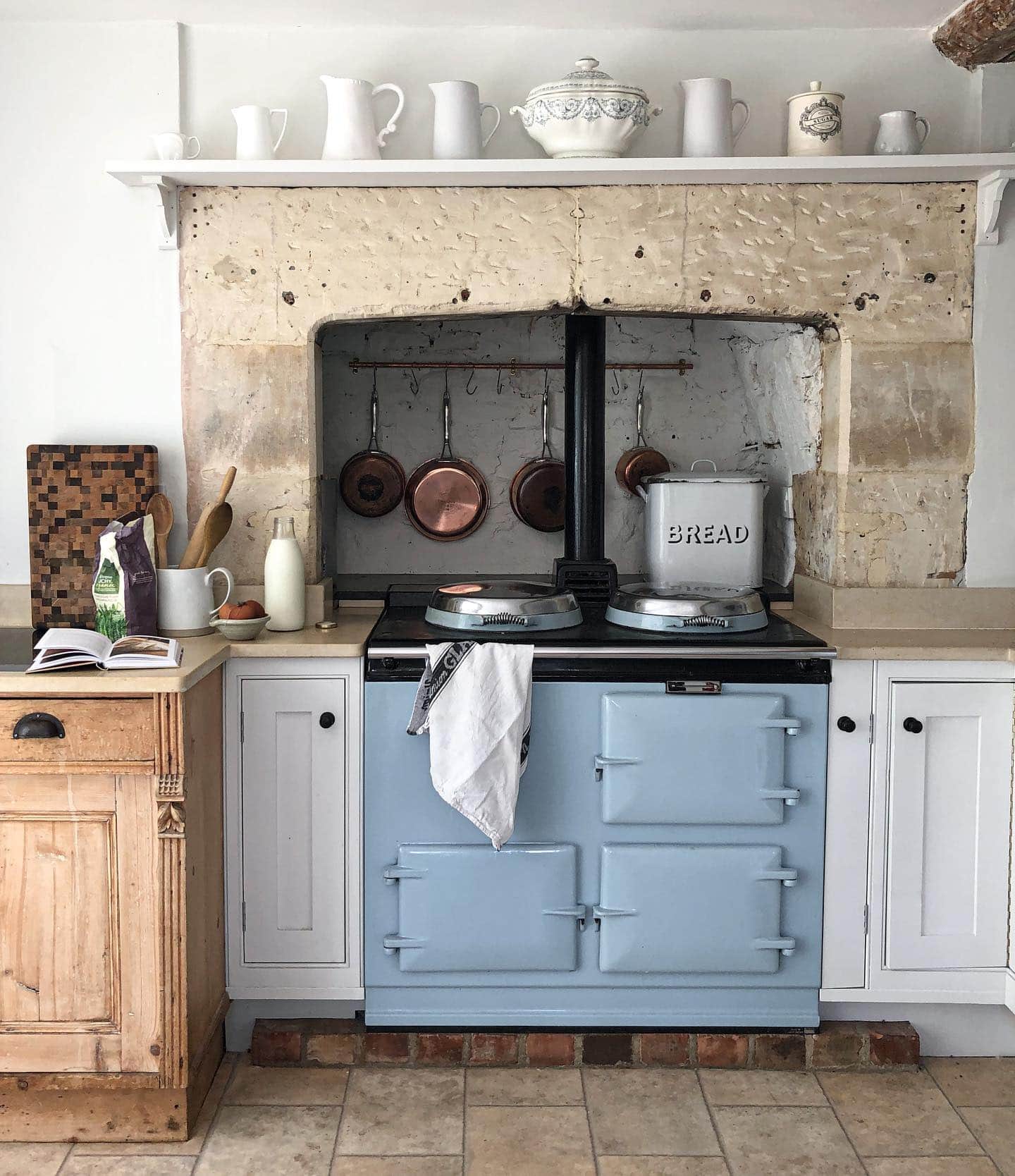 Timeless allure of old homes example showcasing a traditional kitchen with an alcove stove and AGA kitchen