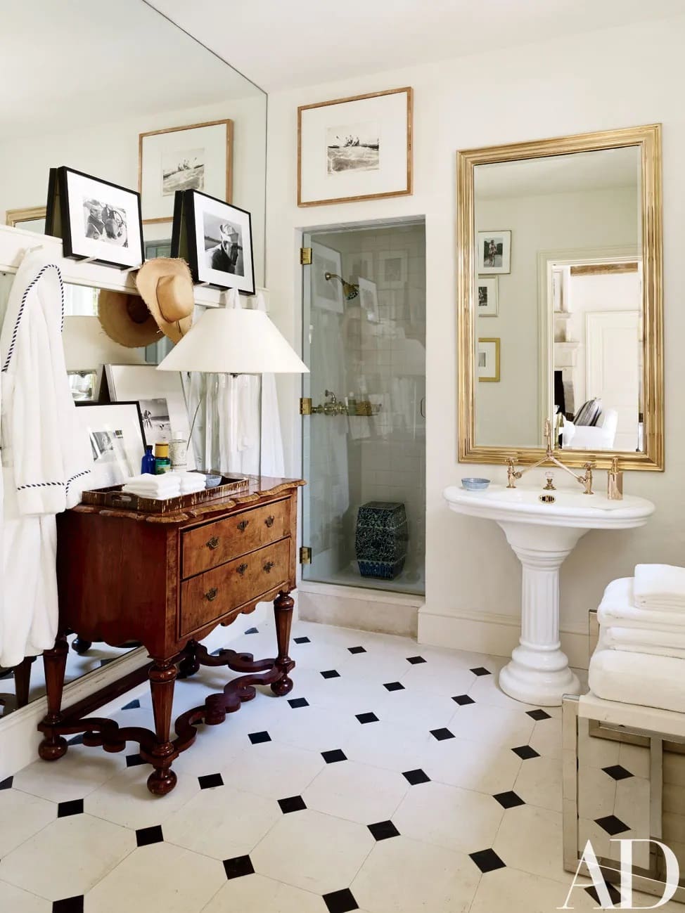 Elegant french style bathroom with antique tiles featured as a example of old homes timeless charm