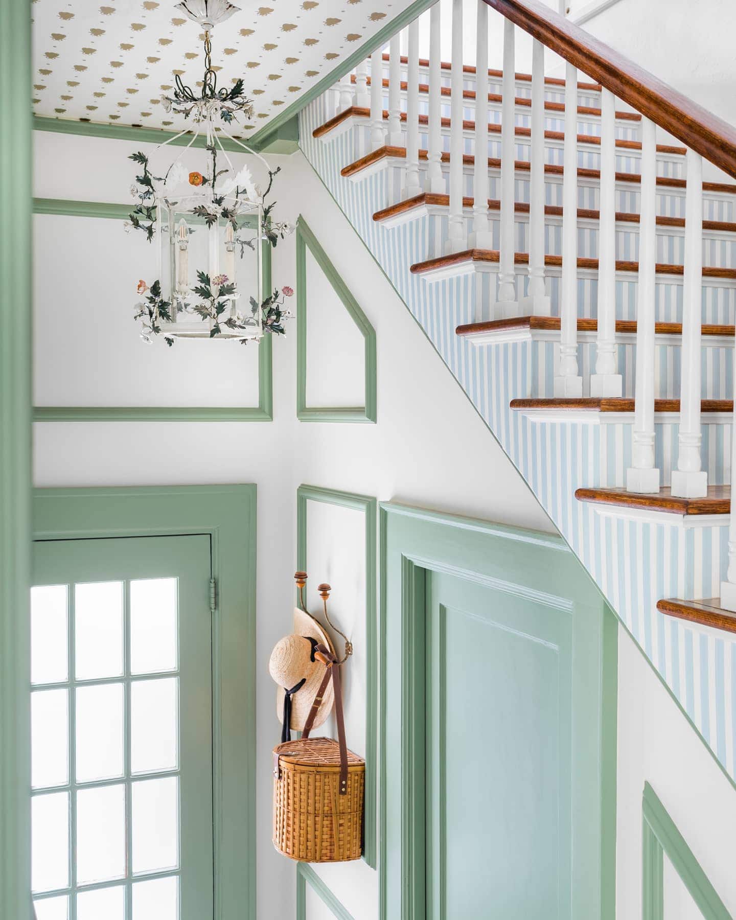 Staircase hallway with white walls and green home decor ideas
