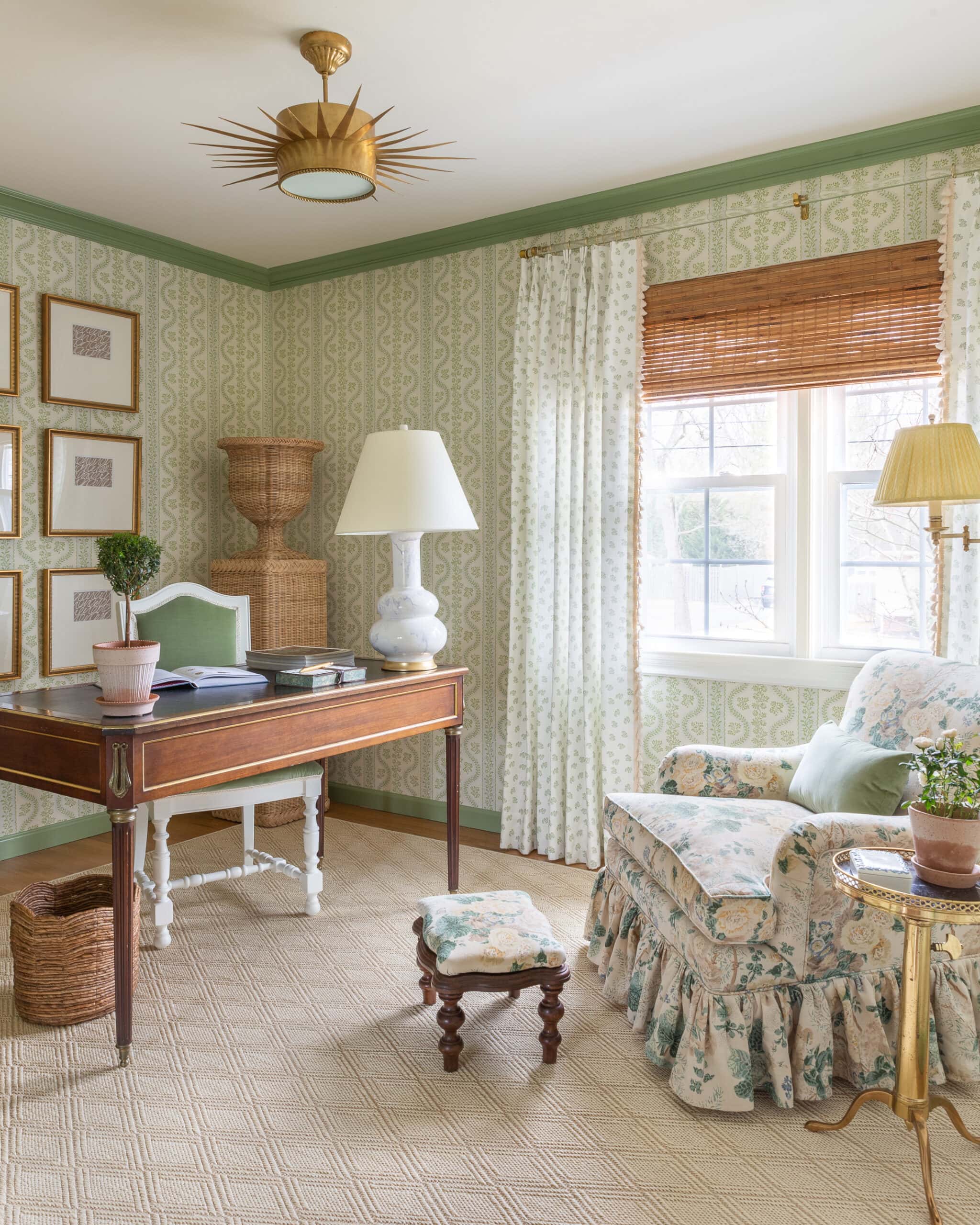 Home office with green wallpaper and trims