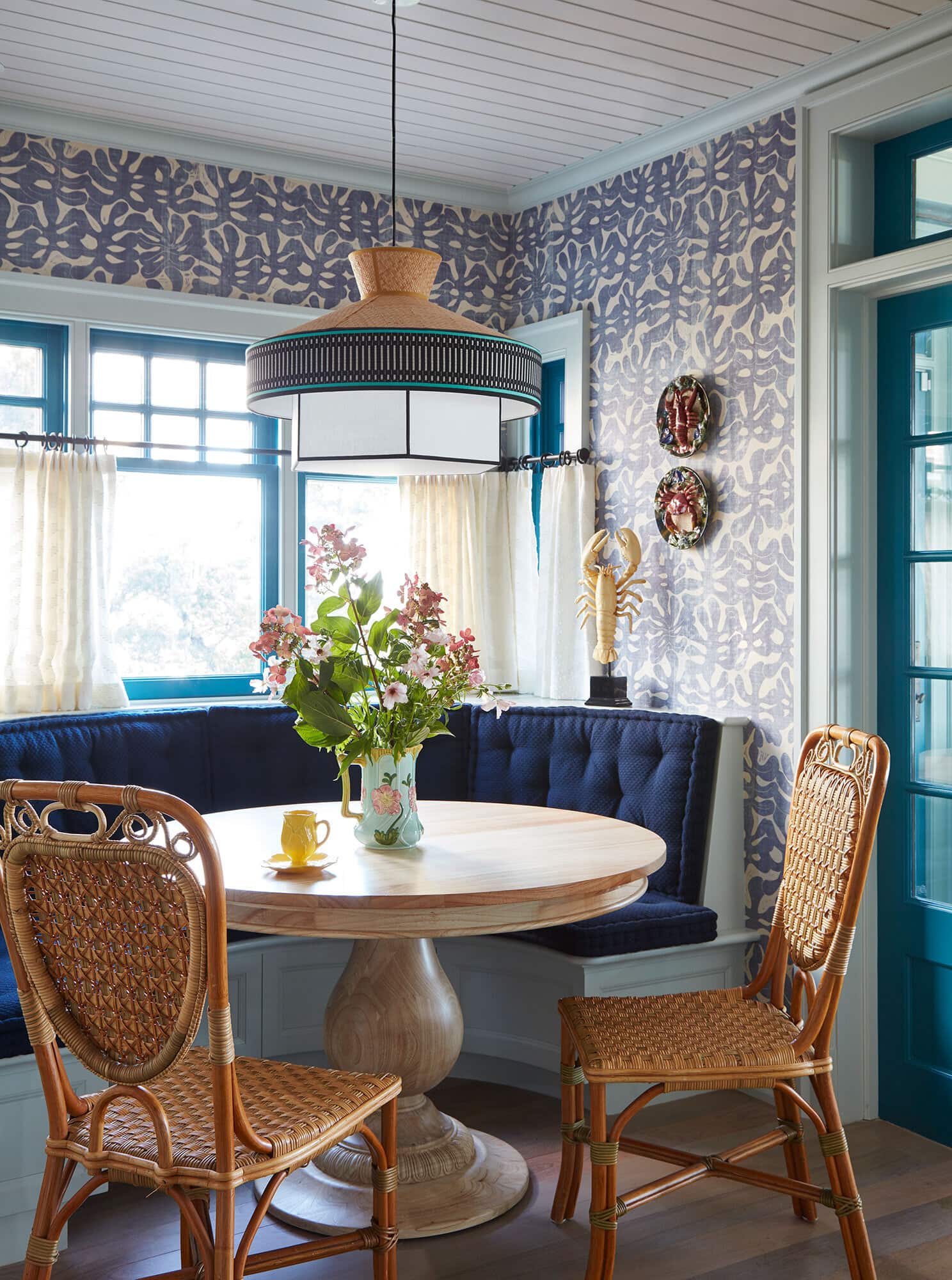 Wesley Moon interior design featuring coastal entrwyway with deep blue walls.