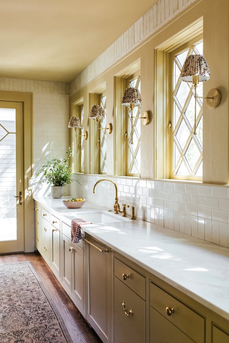 Spring color palette ideas featuring vintage pastel kitchen in soft pale yellow