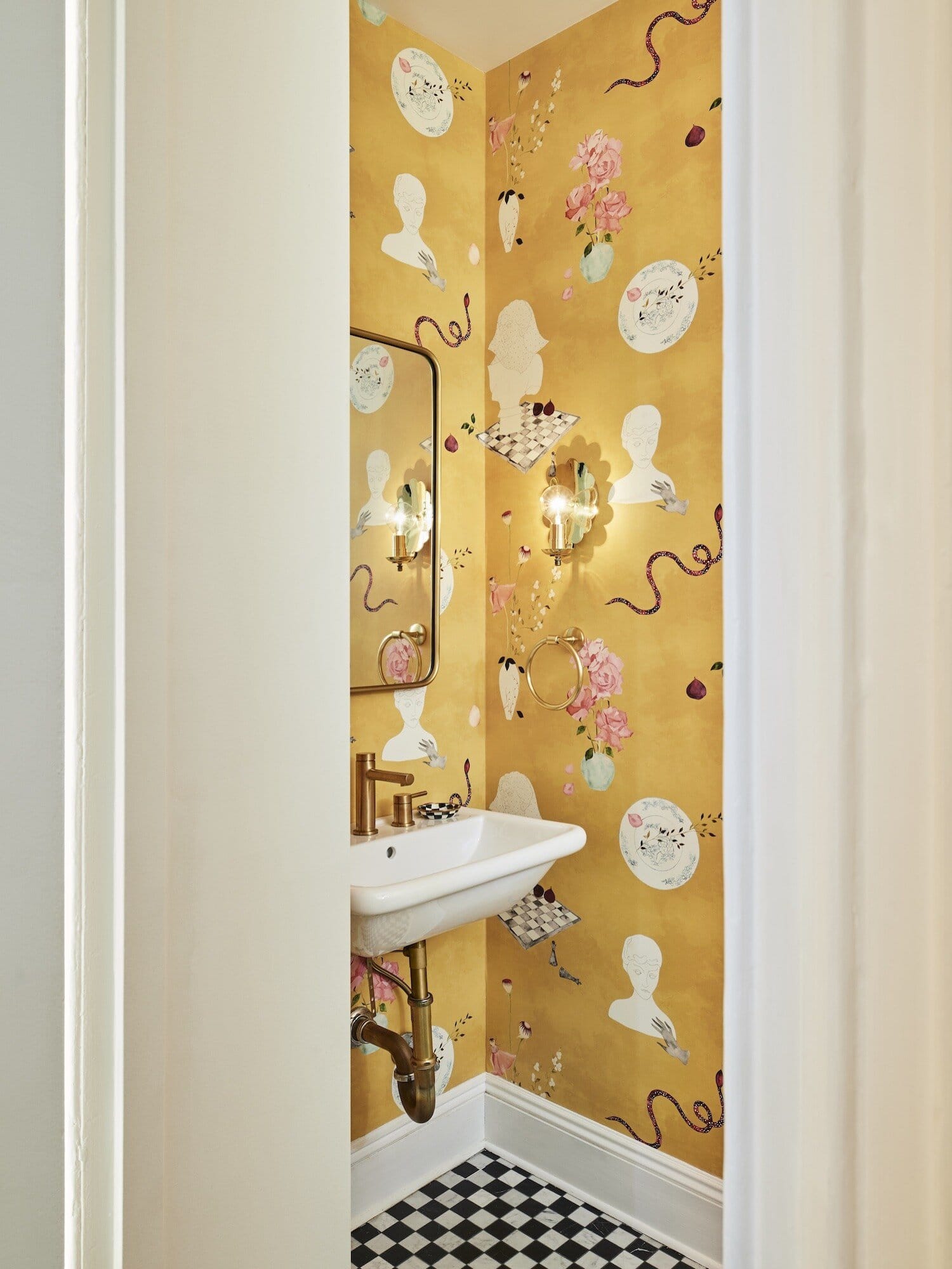 Powder room featuring colorful wallpaper as an example of Style Small Space Ideas