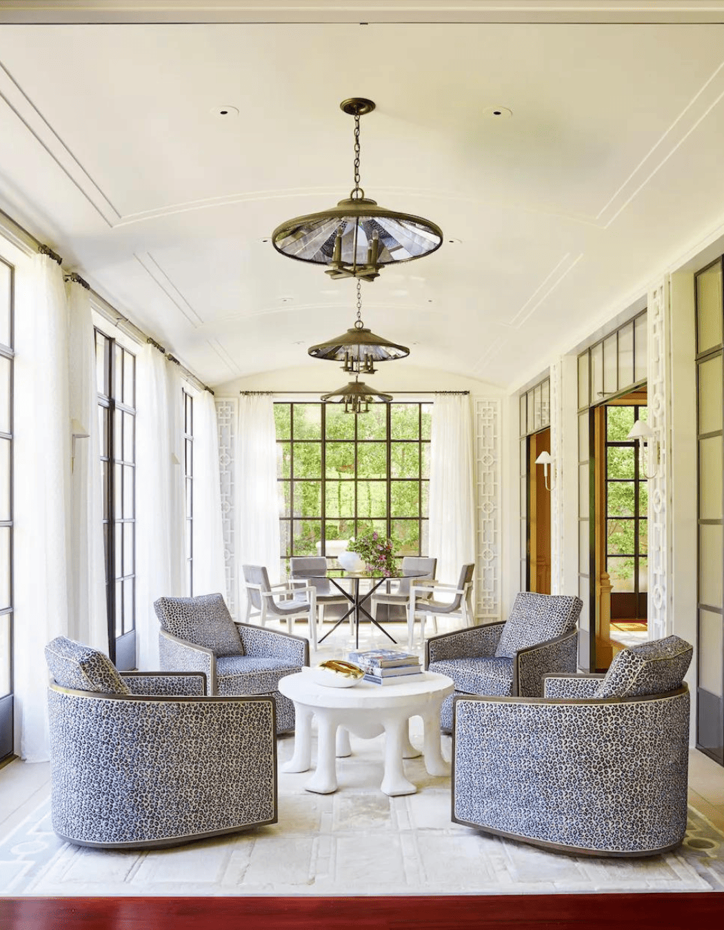 modern interior design in an elegant sunroom designed by Laura Lee Clark