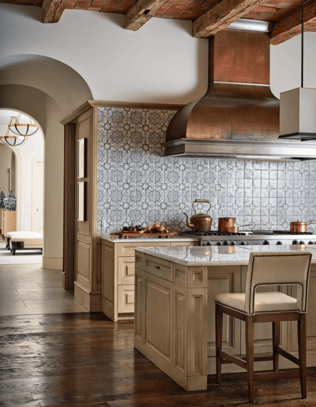 Elegant Mediterranean kitchen designed by Laura Lee Clark