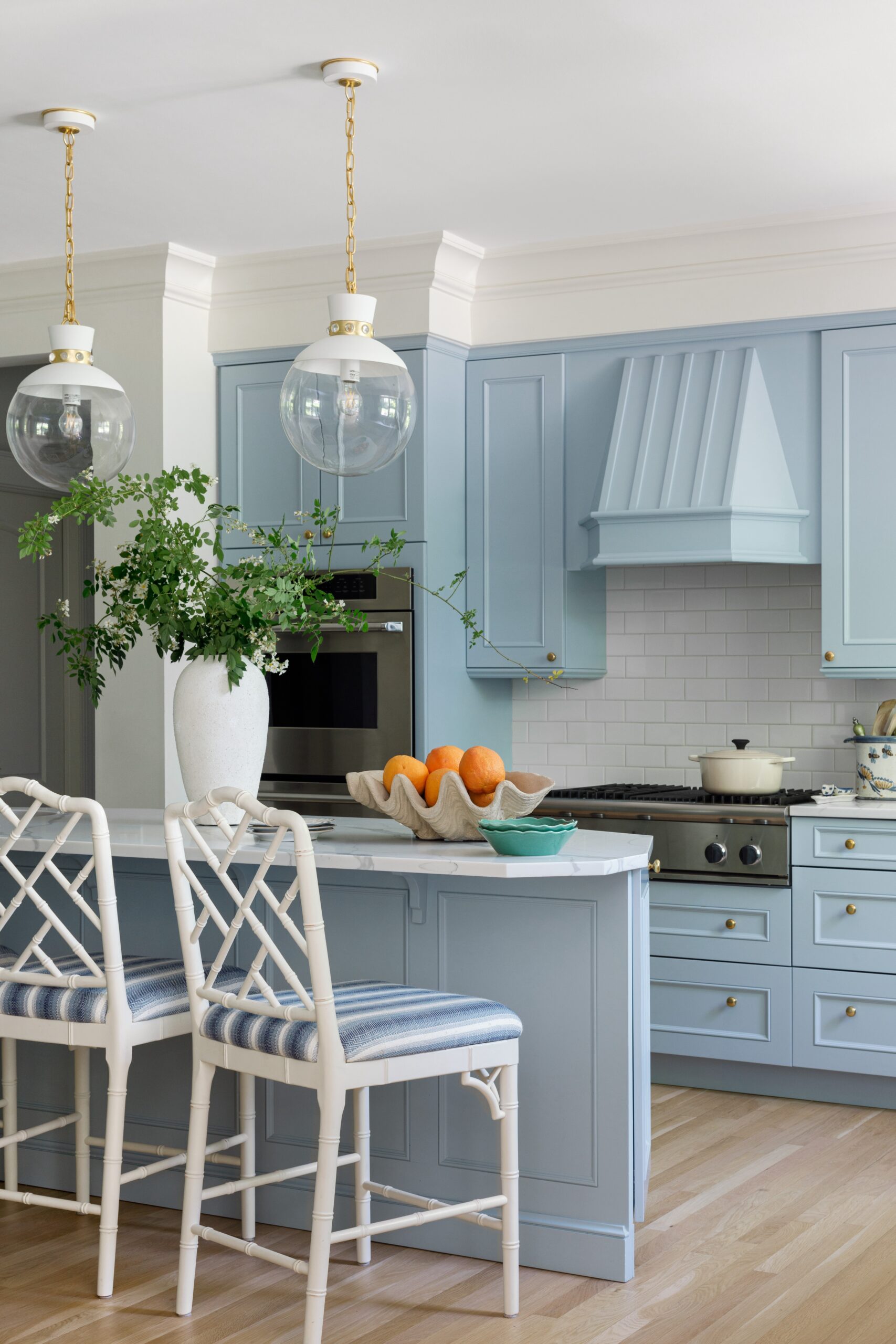 Fresh young design with traditional style kitchen with powder blue color scheme by Alexandra Kaehler.