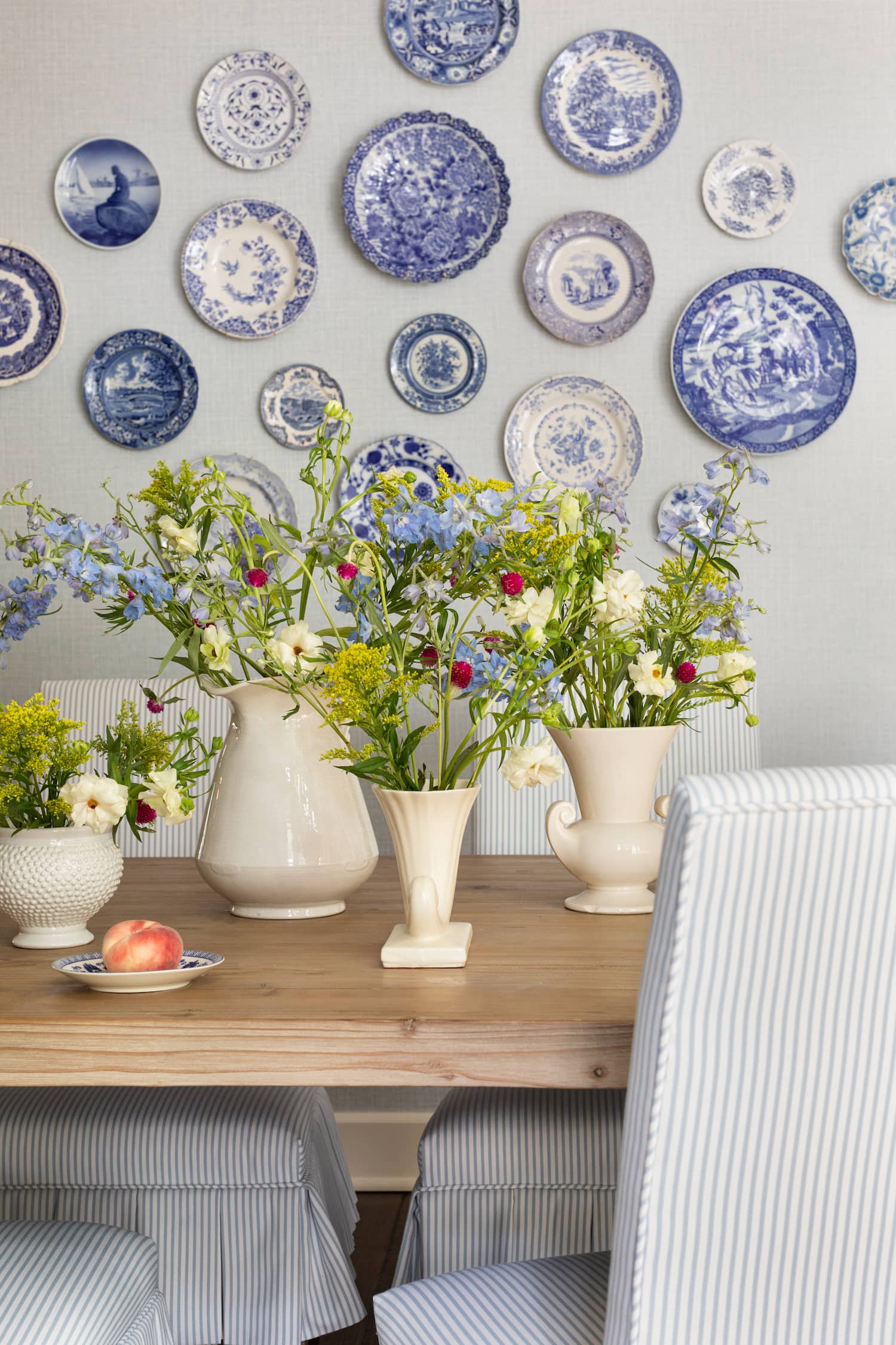 Fresh young design with coastal style breakfast nook by Alexandra Kaehler.