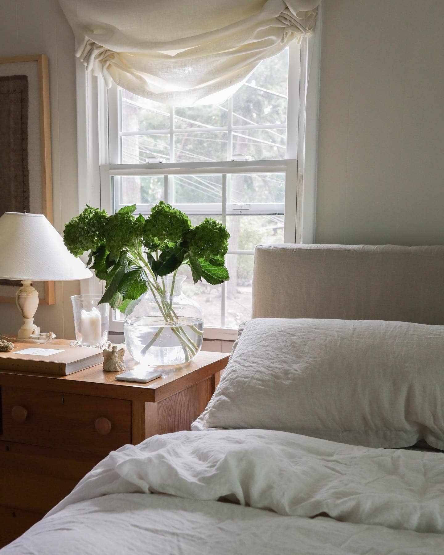 Bedroom window treatment featured as a maximize natural light idea
