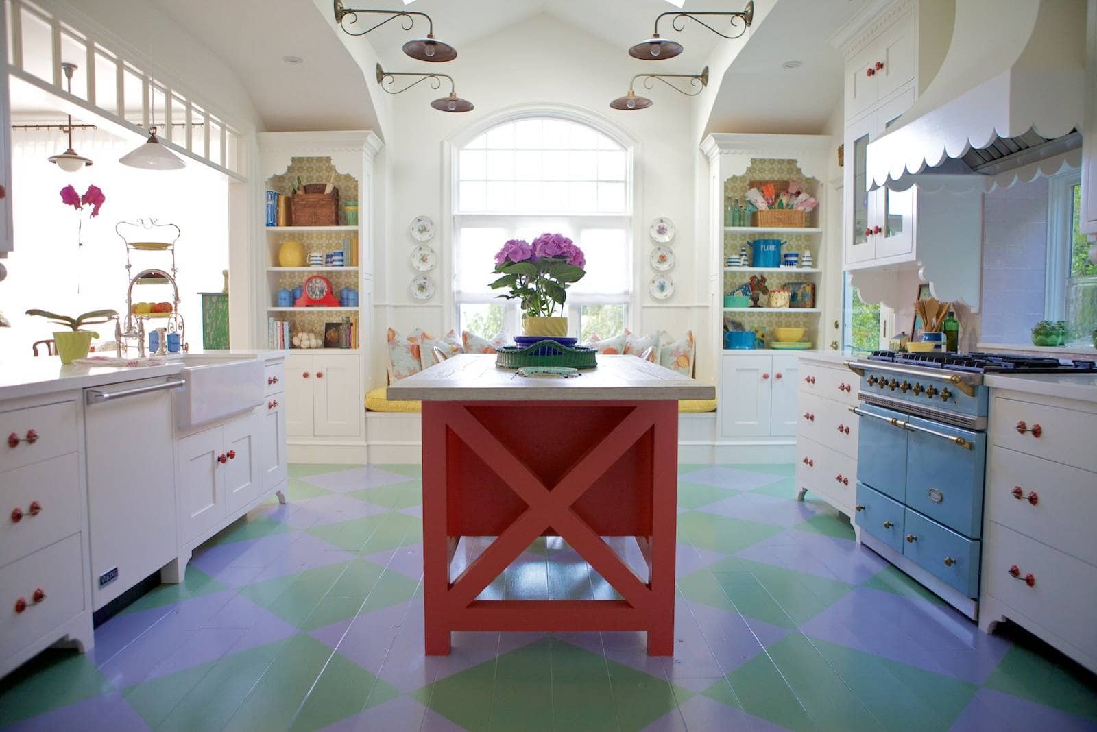 Room in beach english cottage style featuring kitchen with red kitchen island