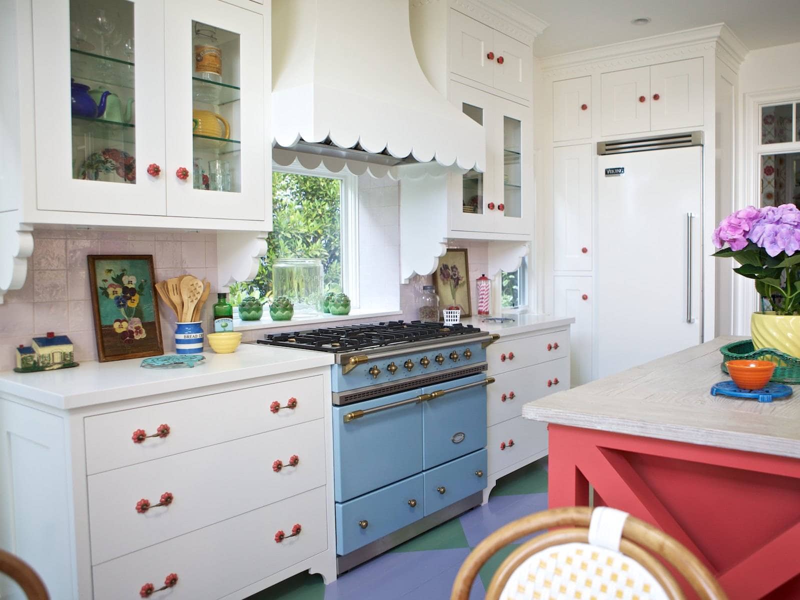 Room in beach english cottage style featuring kitchen with blue range