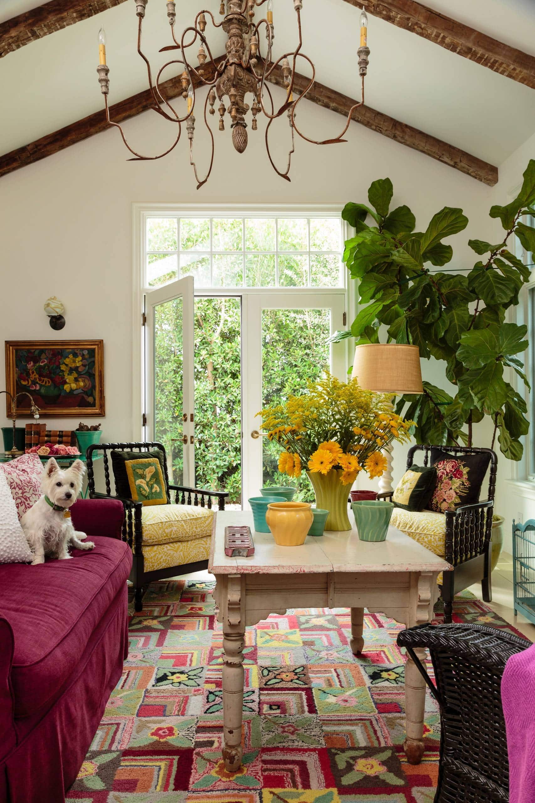 Living room in beach english cottage style featuring tropical plants