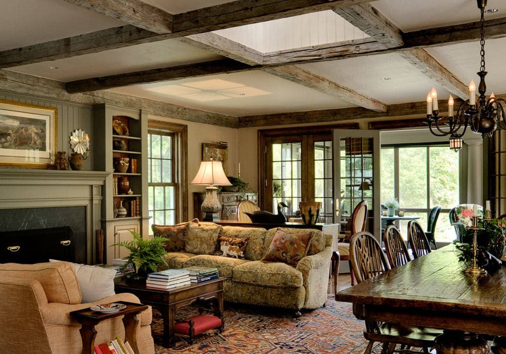 Antique renovated living room featured in home tour with traditional style