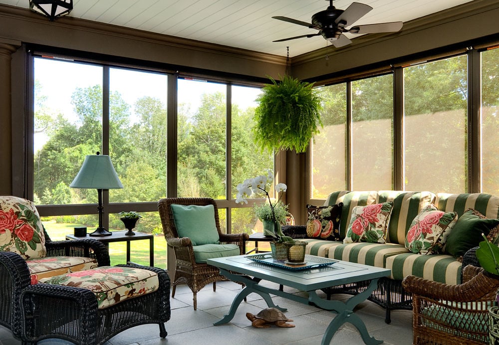 Antique renovated porch room featured in home tour with traditional style