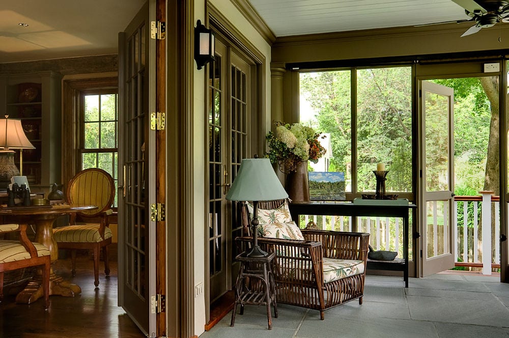 Antique renovated porch room featured in home tour with traditional style