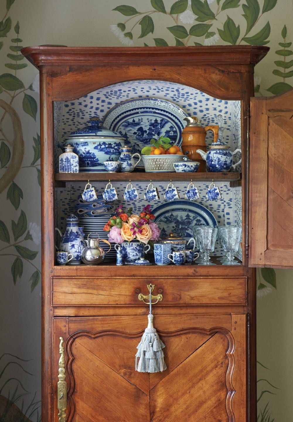 Detail of living room featuring chinoiserie vases and dishes in interiors designed by Heather Chadduck