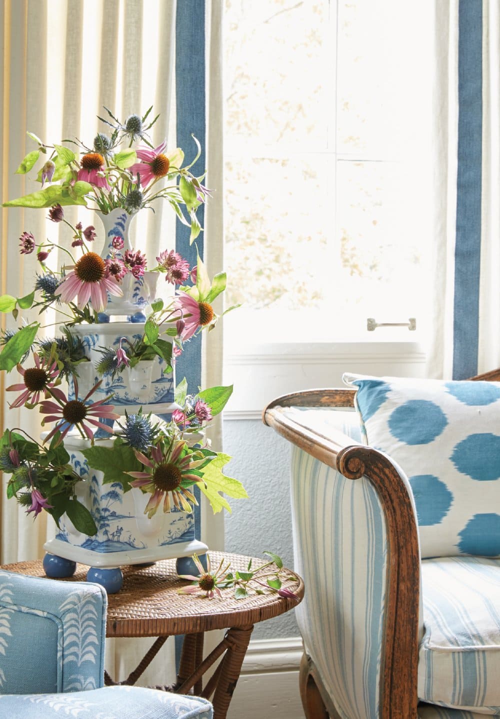 Detail of living room featuring floral arrangement featured in interiors designed by Heather Chadduck