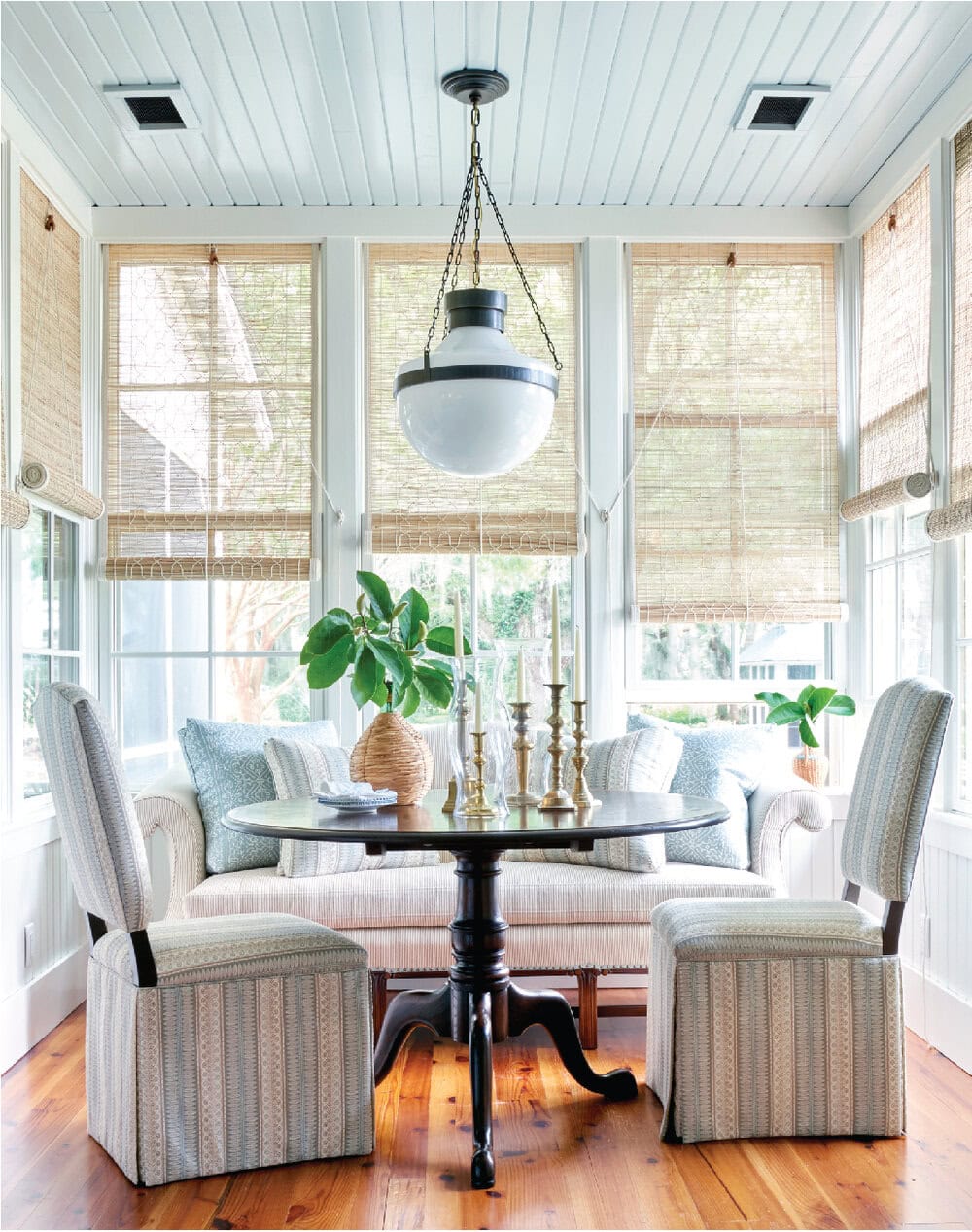 Relaxed elegance design! White and blue kitchen breakfast nook featured in interiors designed by Heather Chadduck