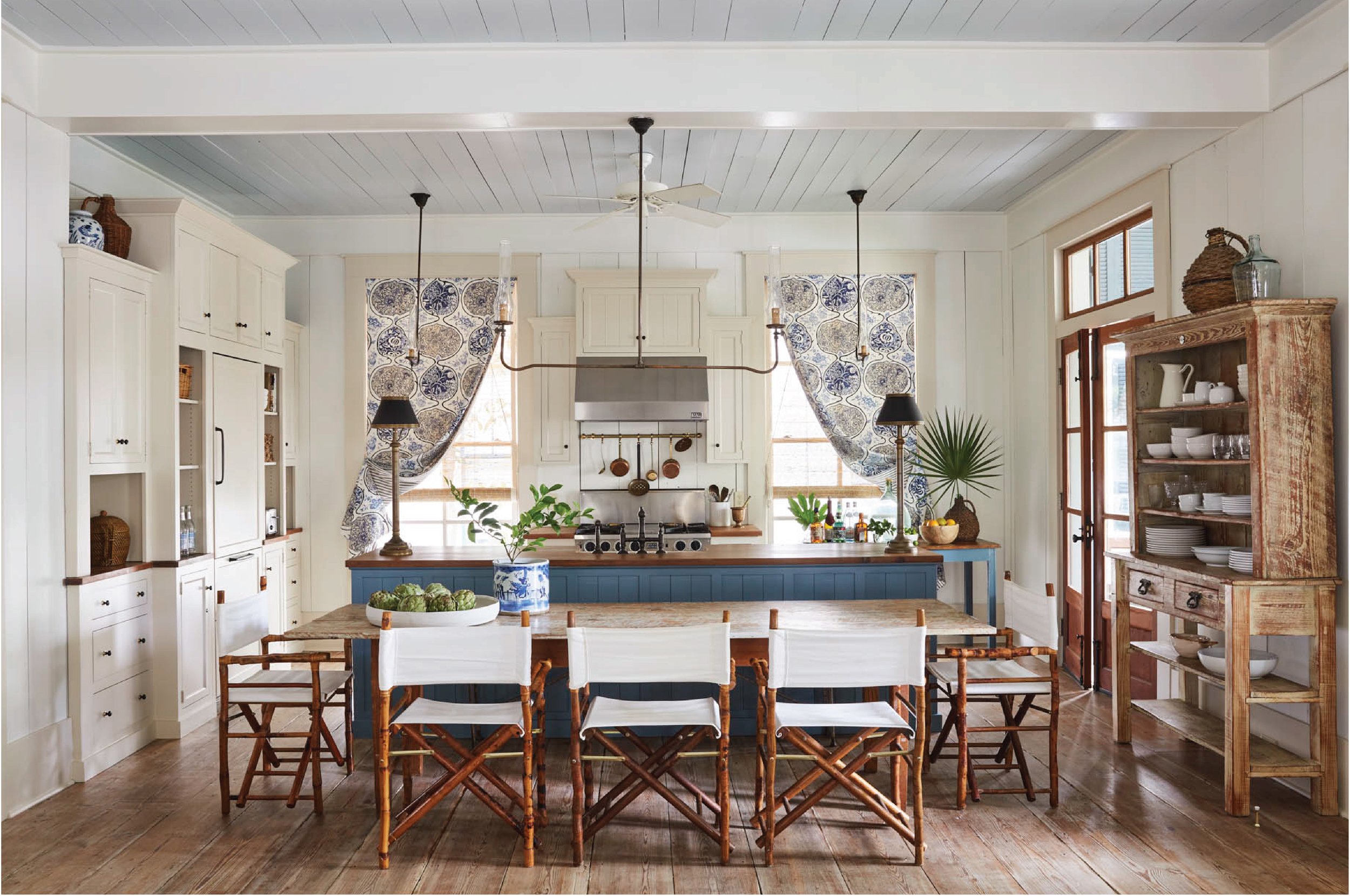 Rustic in white and blue kitchen featured in interiors designed by Heather Chadduck