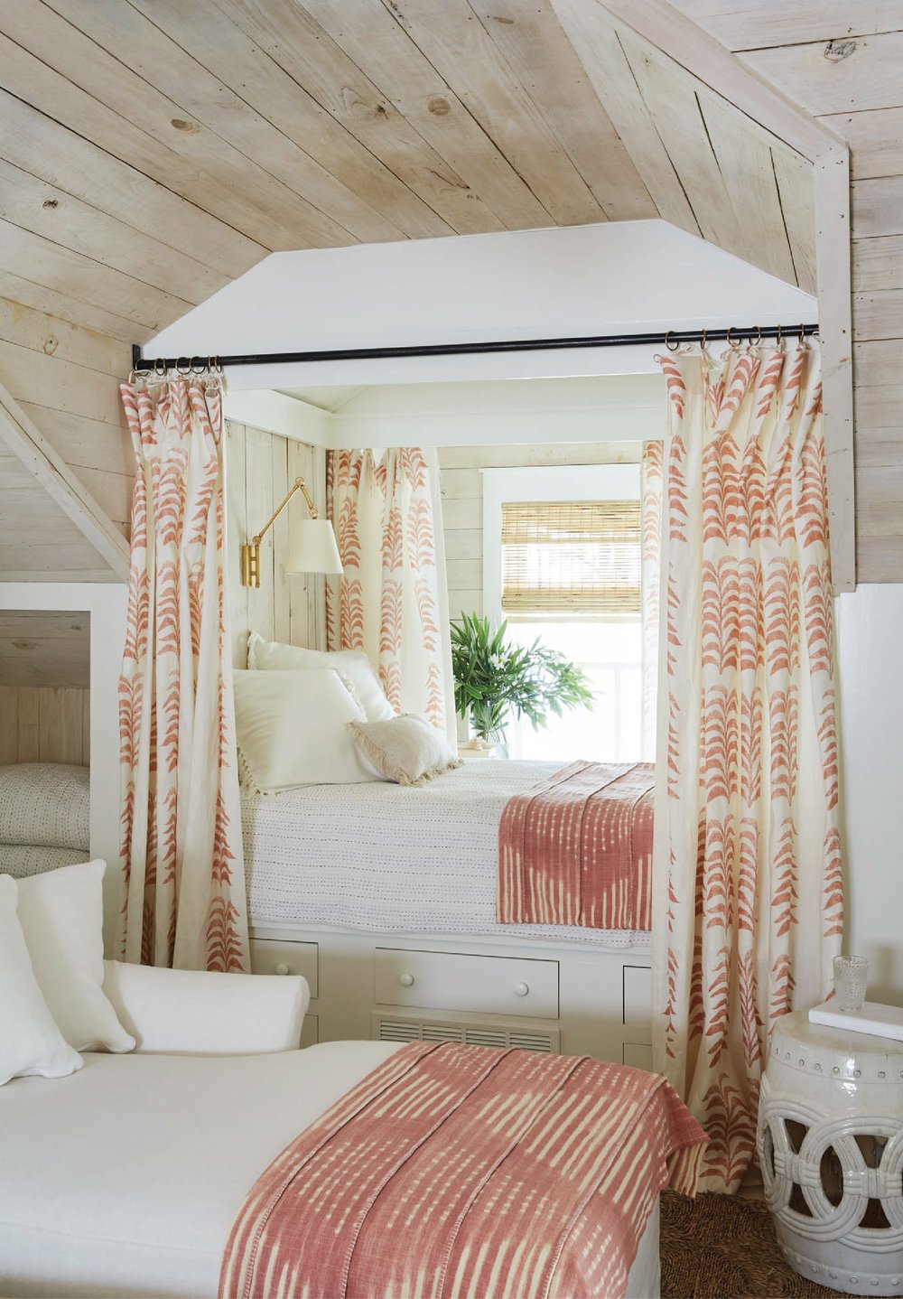 White and pink bedroom featured in interiors designed by Heather Chadduck