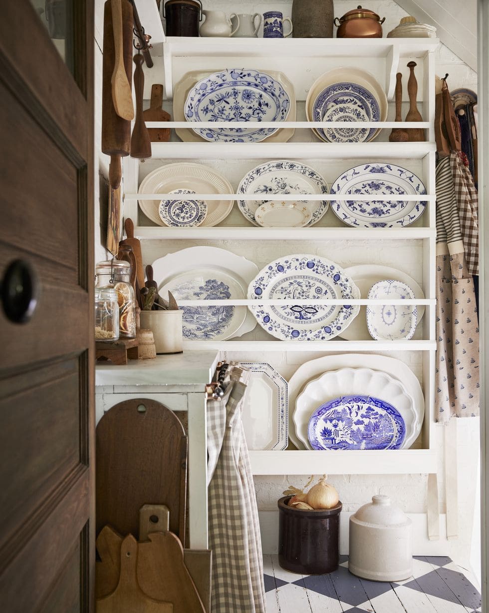 Kitchen featuring a a plate shelf shown as example for old and outdated kitchen ideas