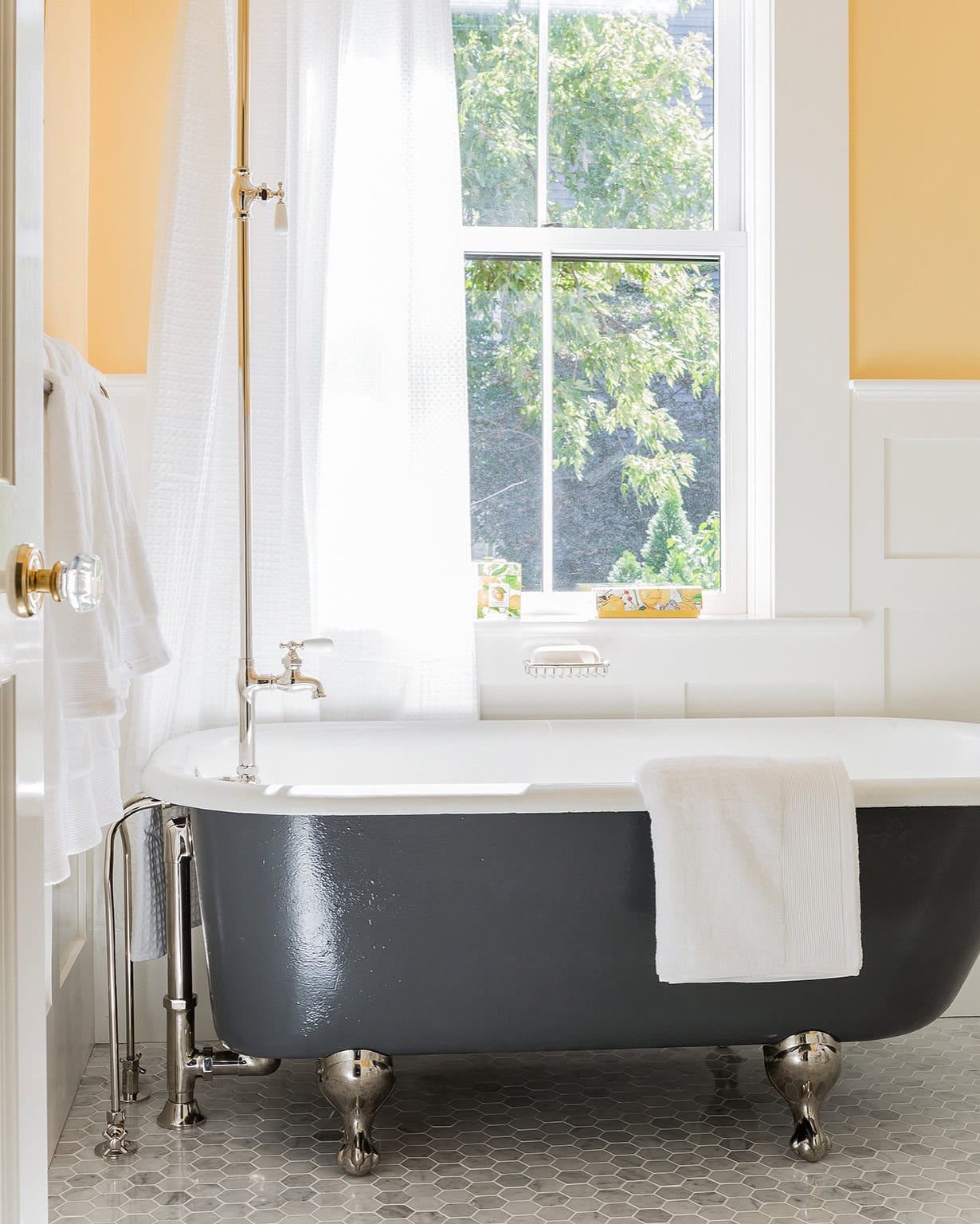 Bathroom in traditional chic style featured in renovation home tour