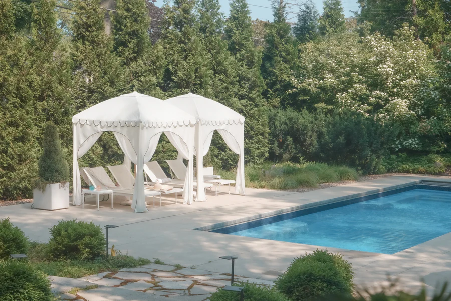 Budget-friendly patio and pool Budget-Friendly Pool and Patio Must-Haves for Summer Serenity example showcasing traditional european poolside