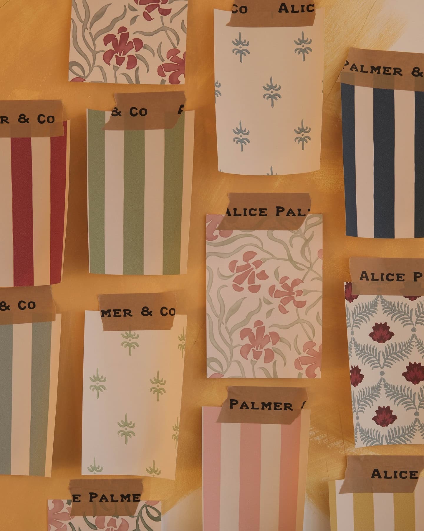 wall with wallpaper samples featured in tips on how to avoid common decorating mistakes