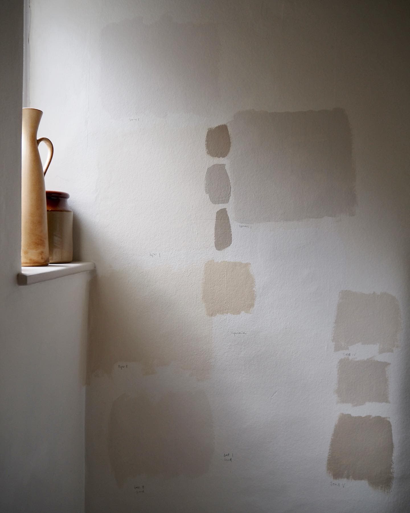 wall with color paint swatches featured in tips on how to avoid common decorating mistakes
