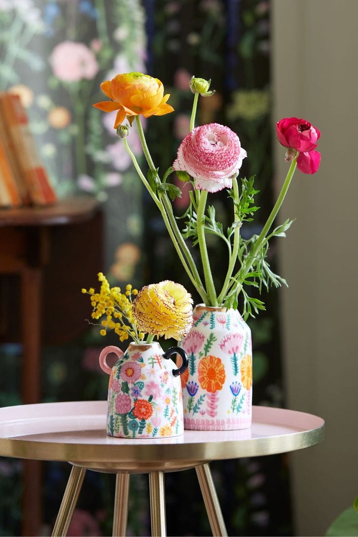 Mini flower vases featured as a summer decor ideas