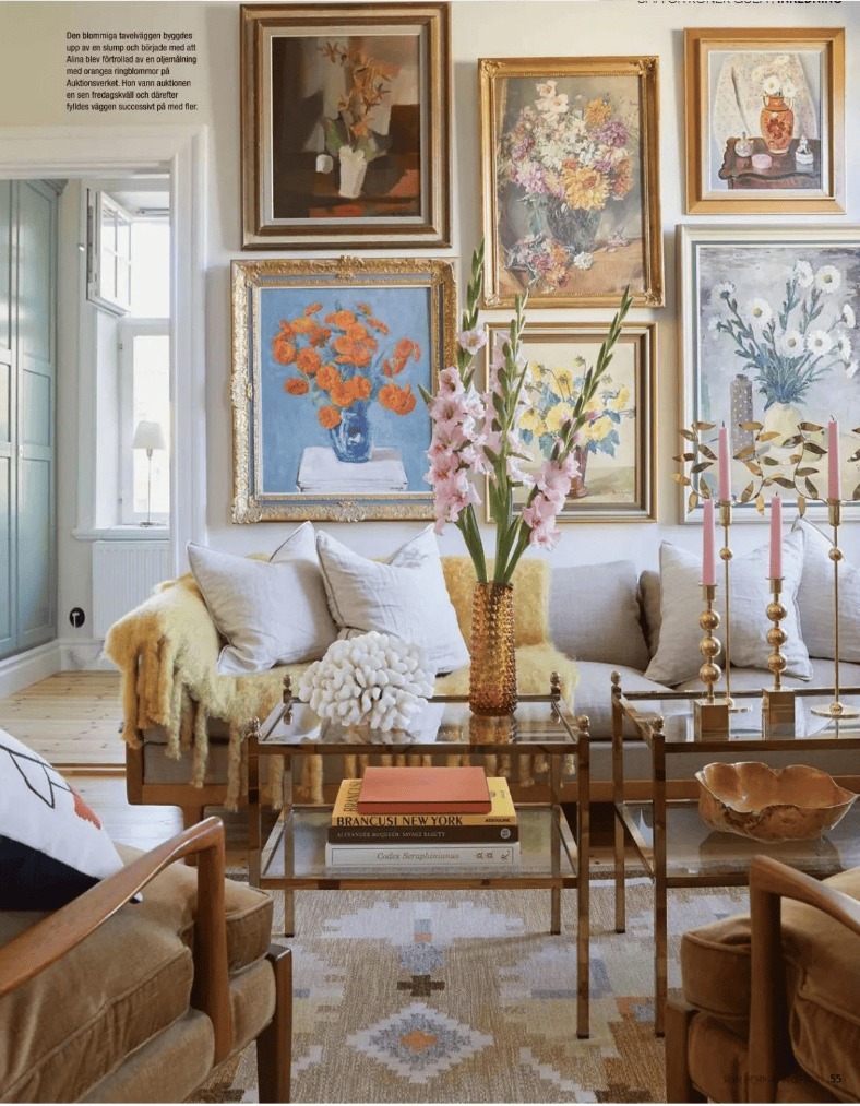 traditional living room with floral arrangements and painting featured in summer decor ideas