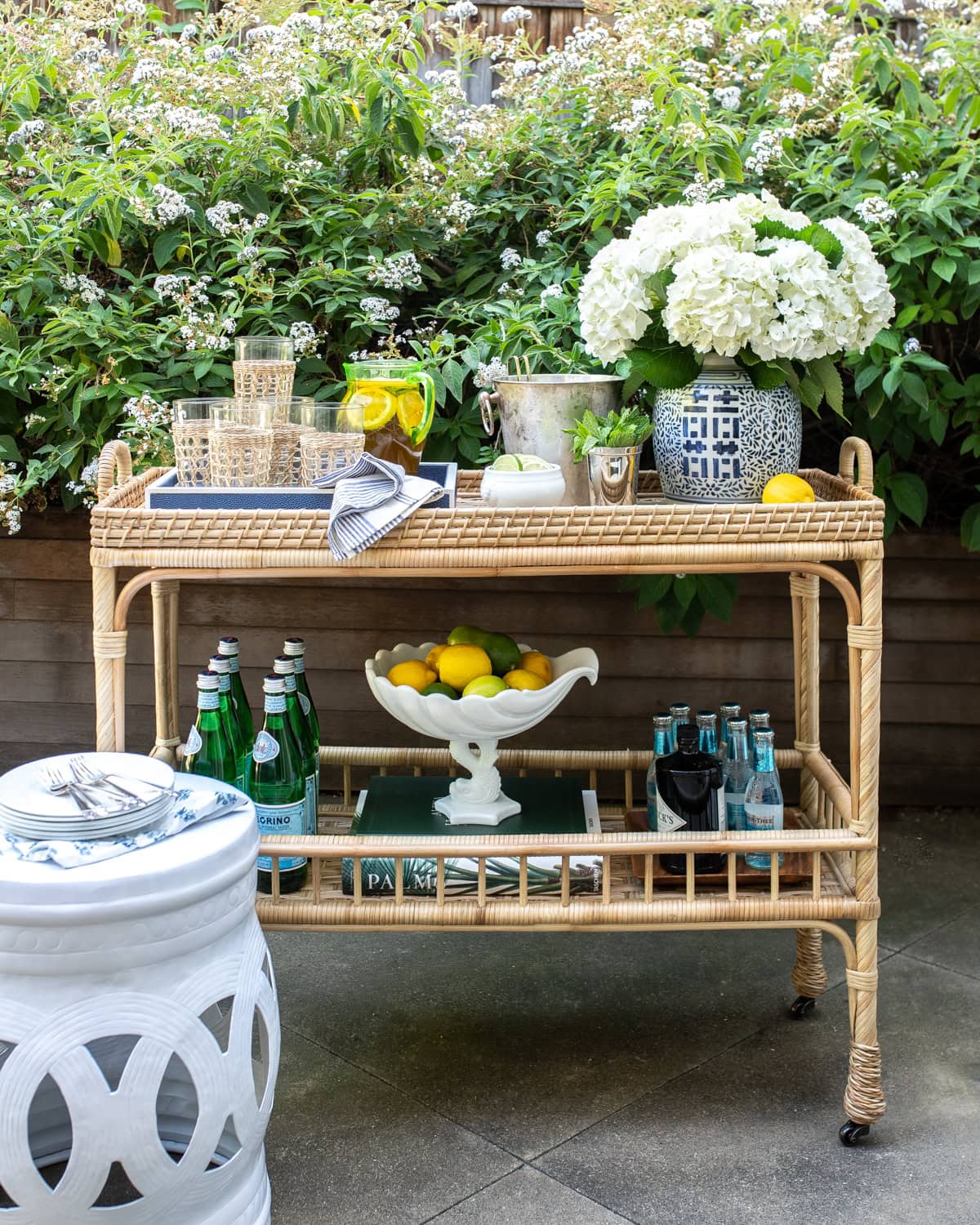 Bar cart featuring drinks and coastal decor featured in summer decor ideas