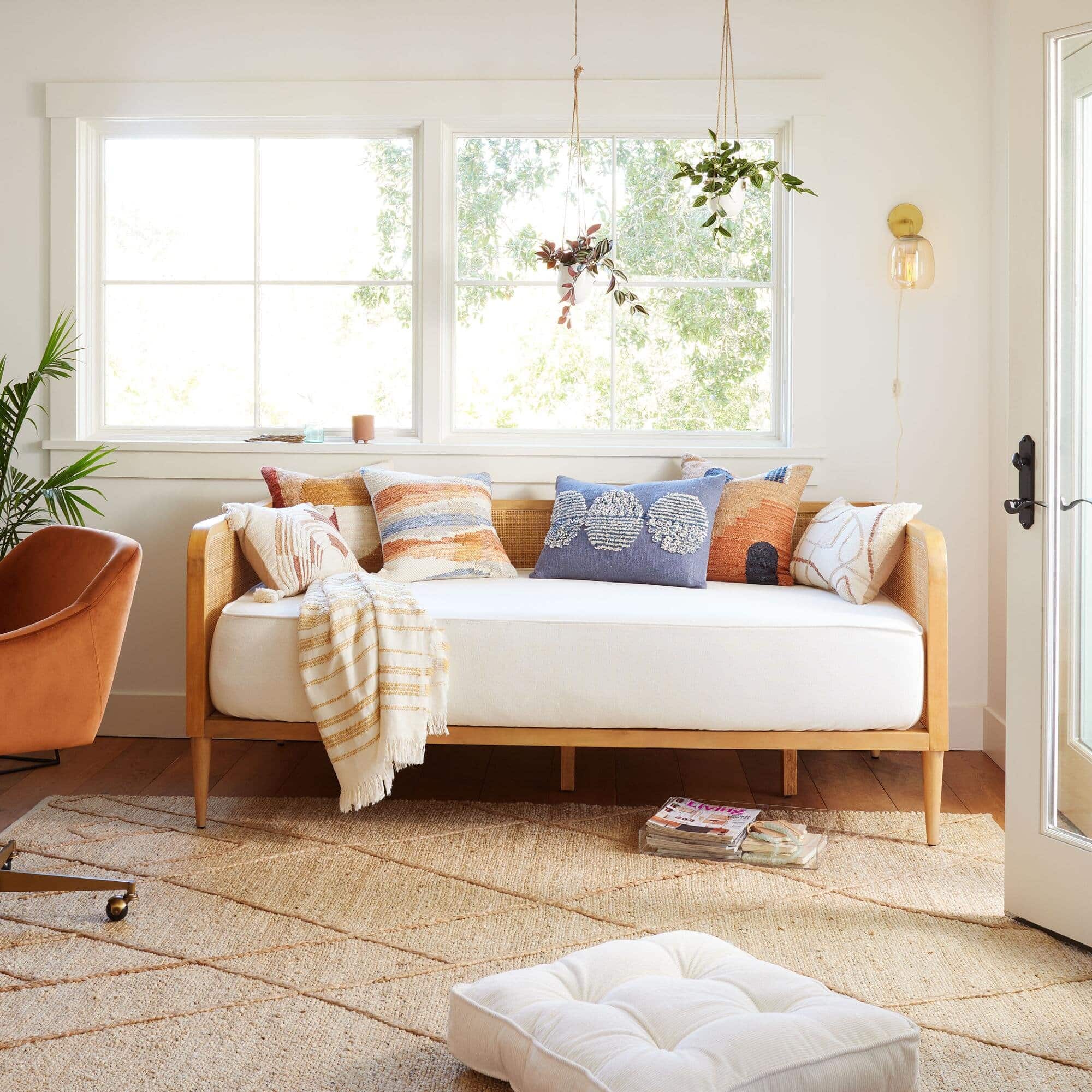 Daybed in clean and neutral study room featured in summer decor ideas