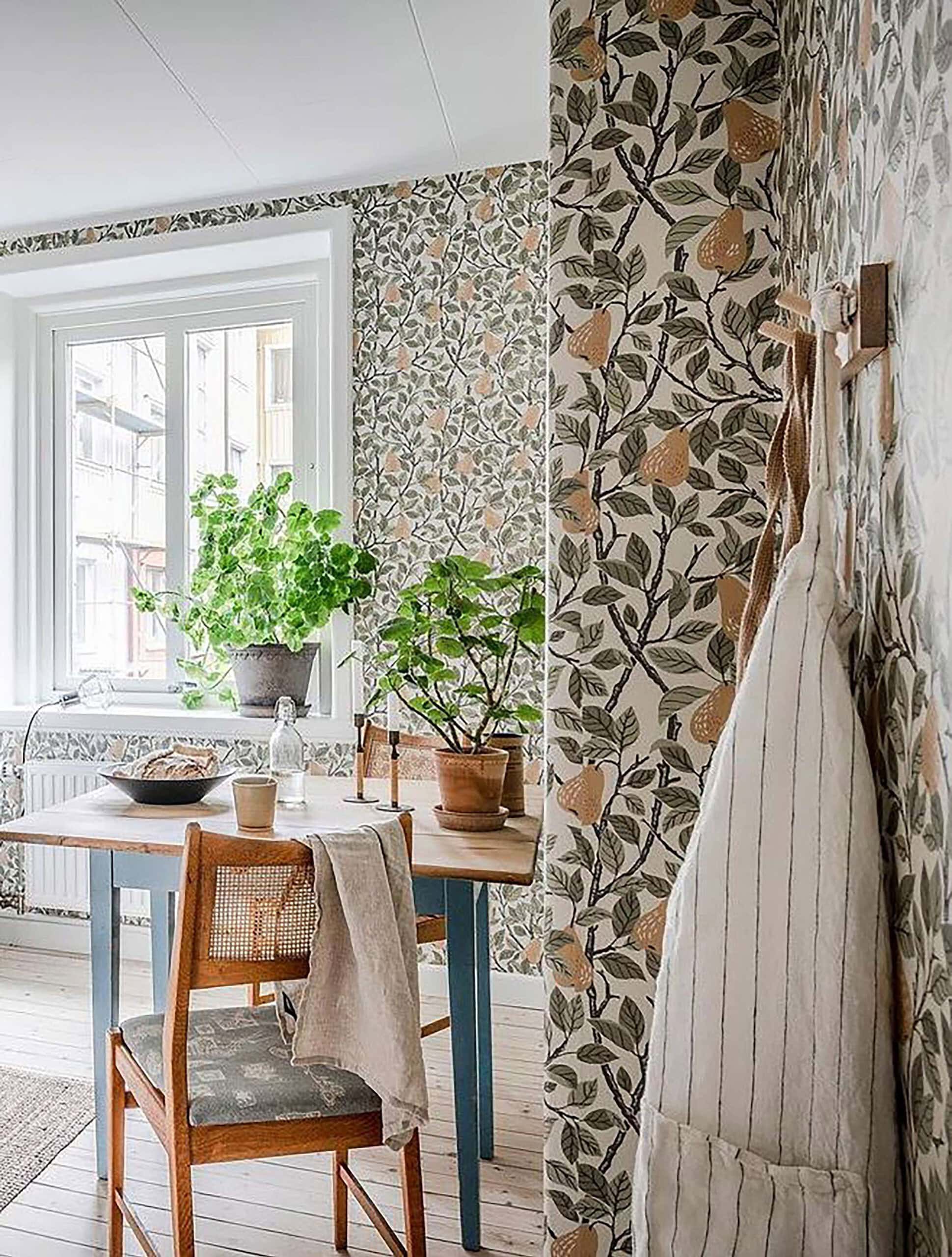 breakfast nook with lemon themed wallpaper featured in summer decor tips