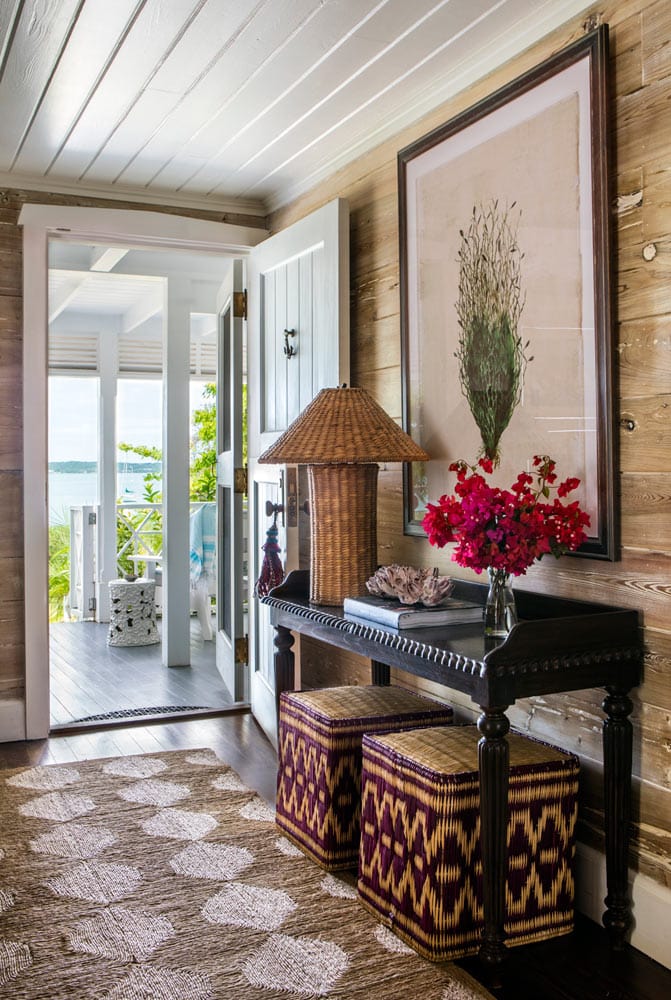 Entryway with floral arrangements, and summer elements featured in summer decor tips