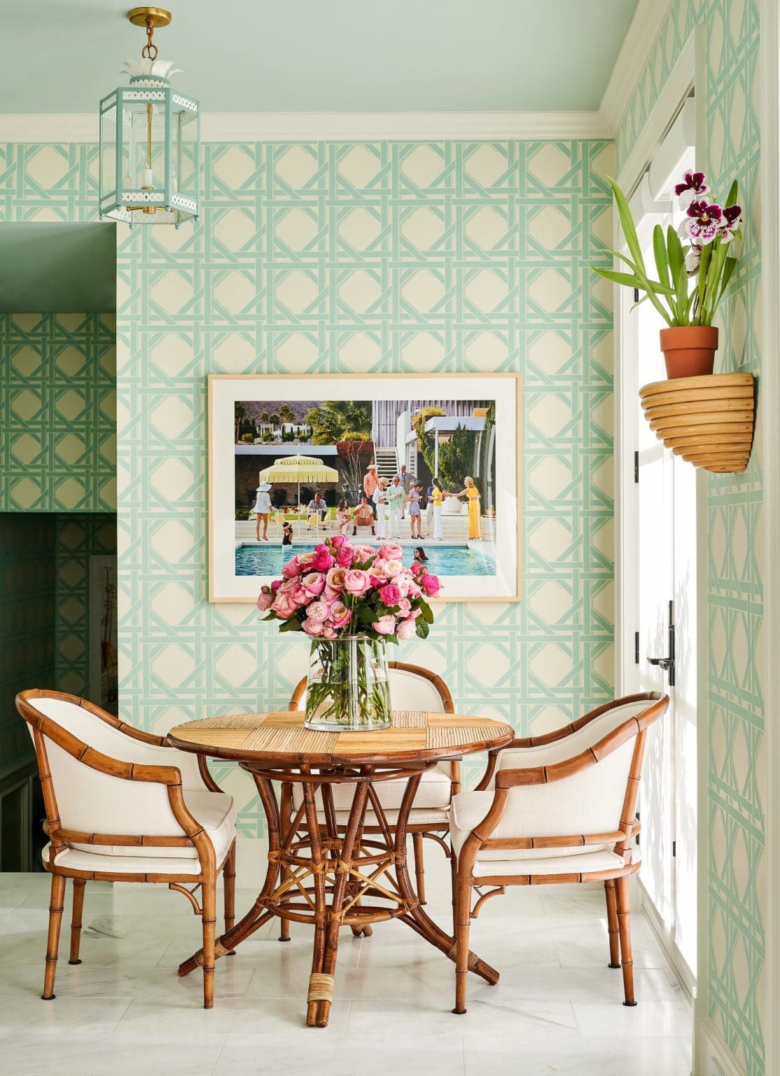 tropical decor breakfast nook featuring tropical wallpaper