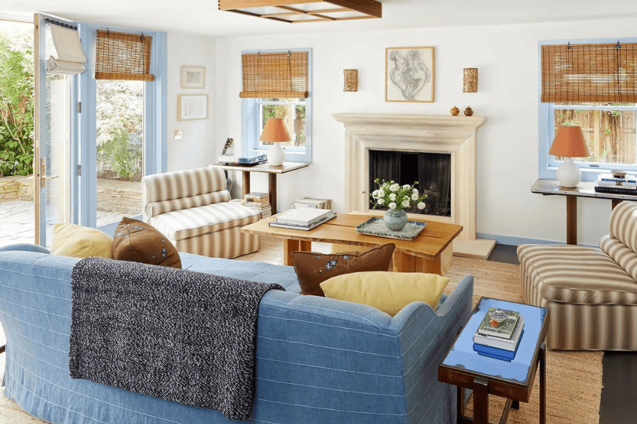 Room in traditional coastal, example of blue living room ideas with blue accents