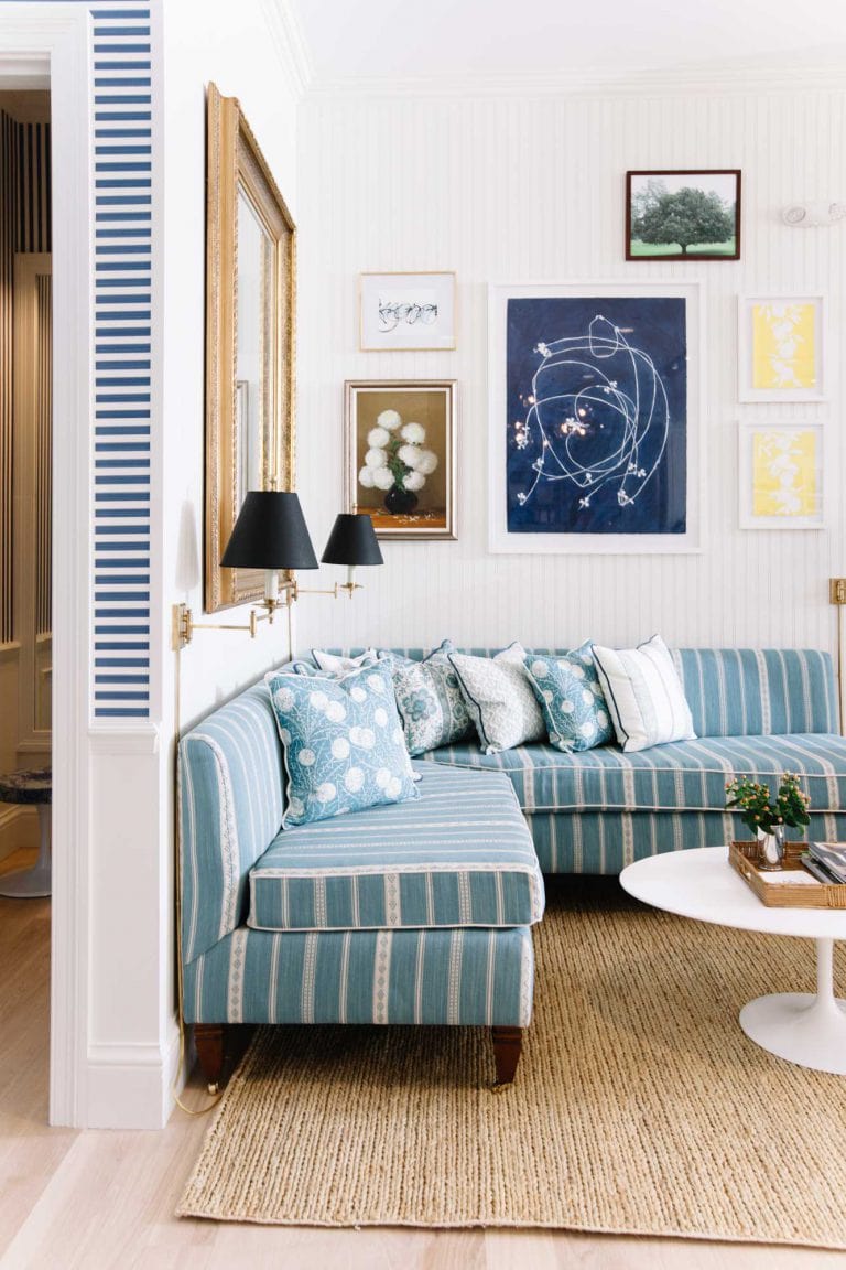 Room in traditional coastal, example of blue living room ideas with blue accents