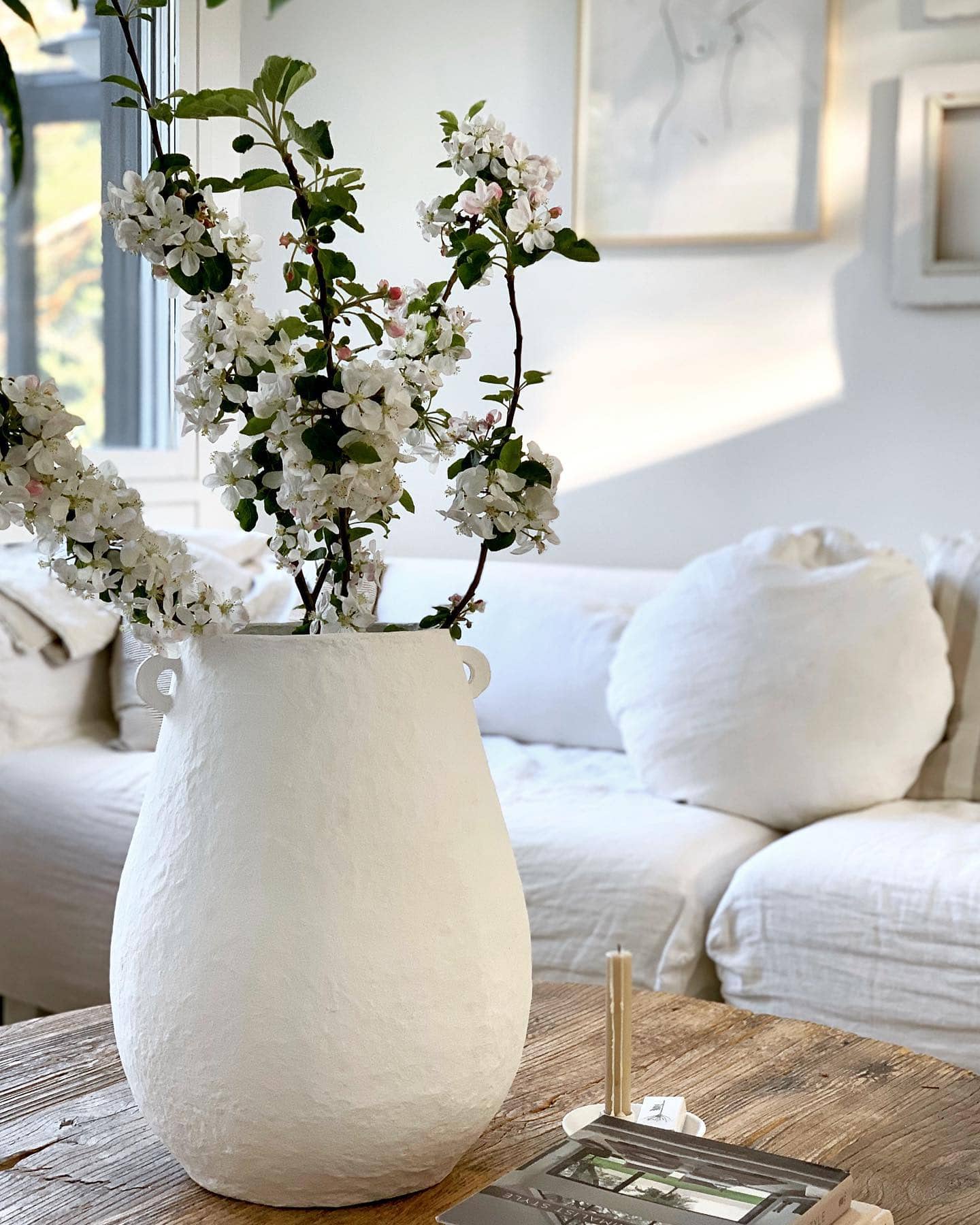 Minimalist decor for summer idea featuring floral arrangement.