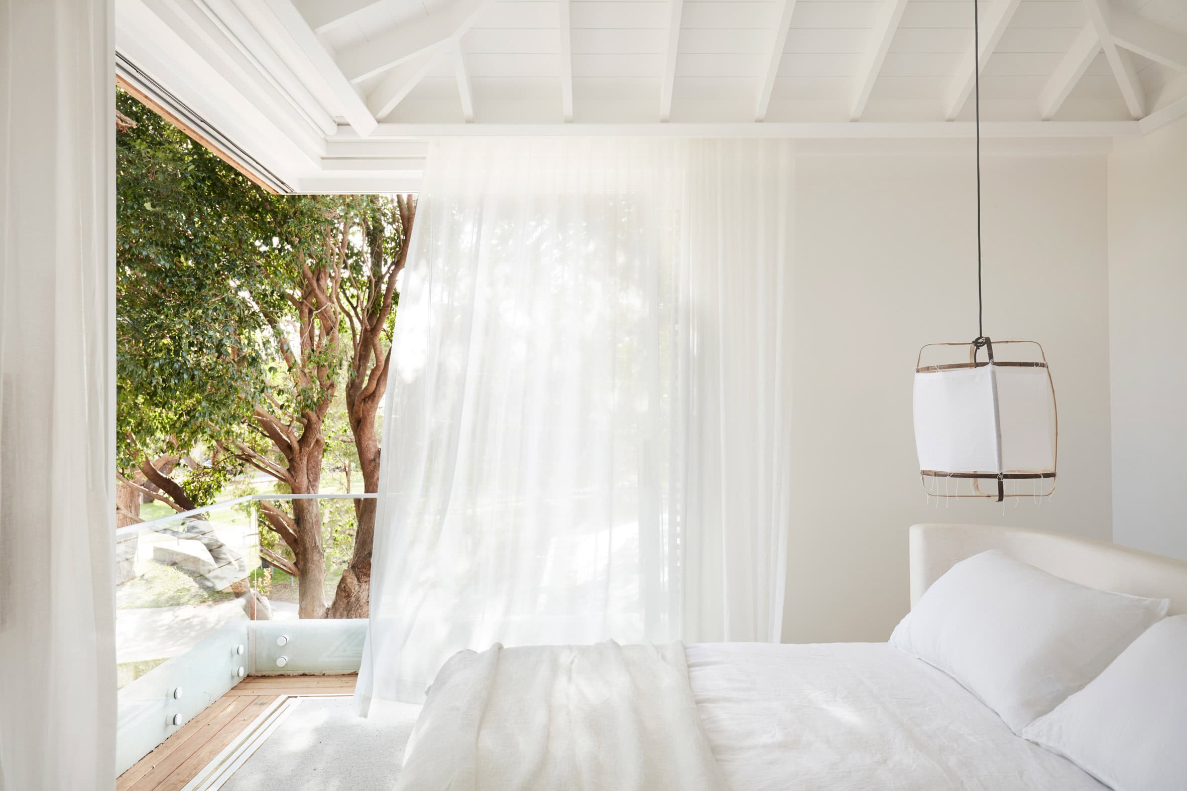 Minimalist decor for summer idea featuring tropical white bedroom